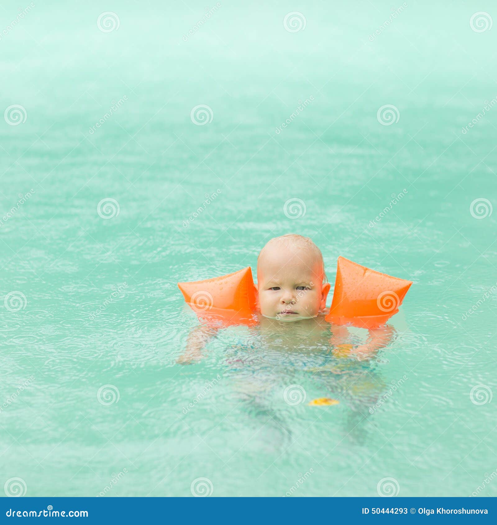 Baby with armbands stock image. Image of loughing, happy 50444293