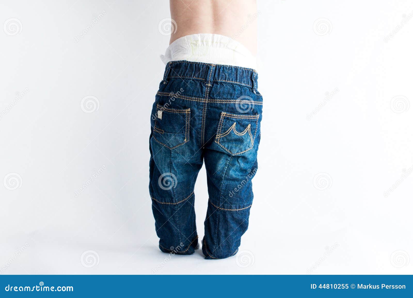 voorbeeld ethisch krijgen Baby in baggy jeans stock image. Image of baby, jeans - 44810255