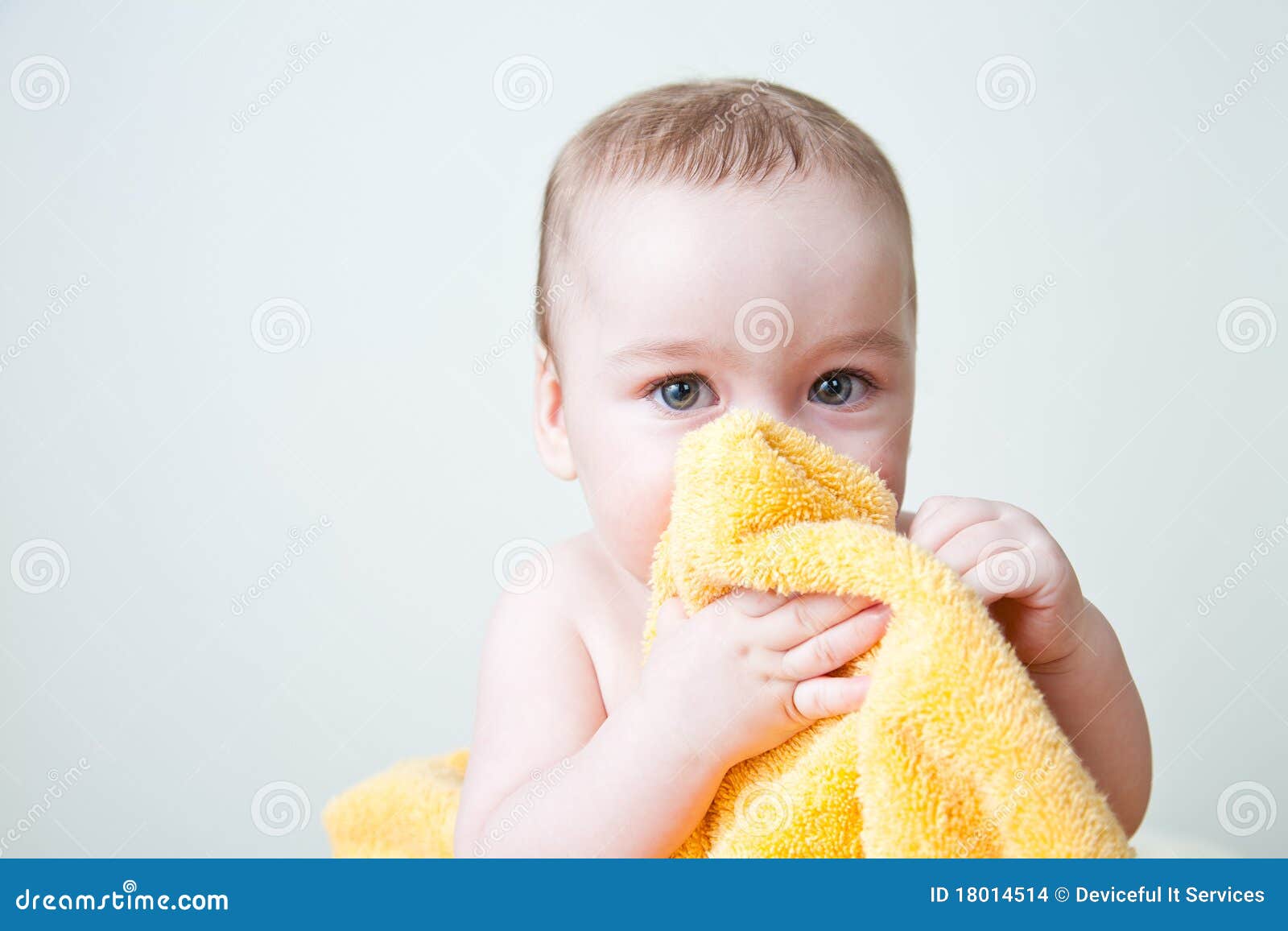 Baby After Bath Hiding Behind Yellow Towel Stock Images 
