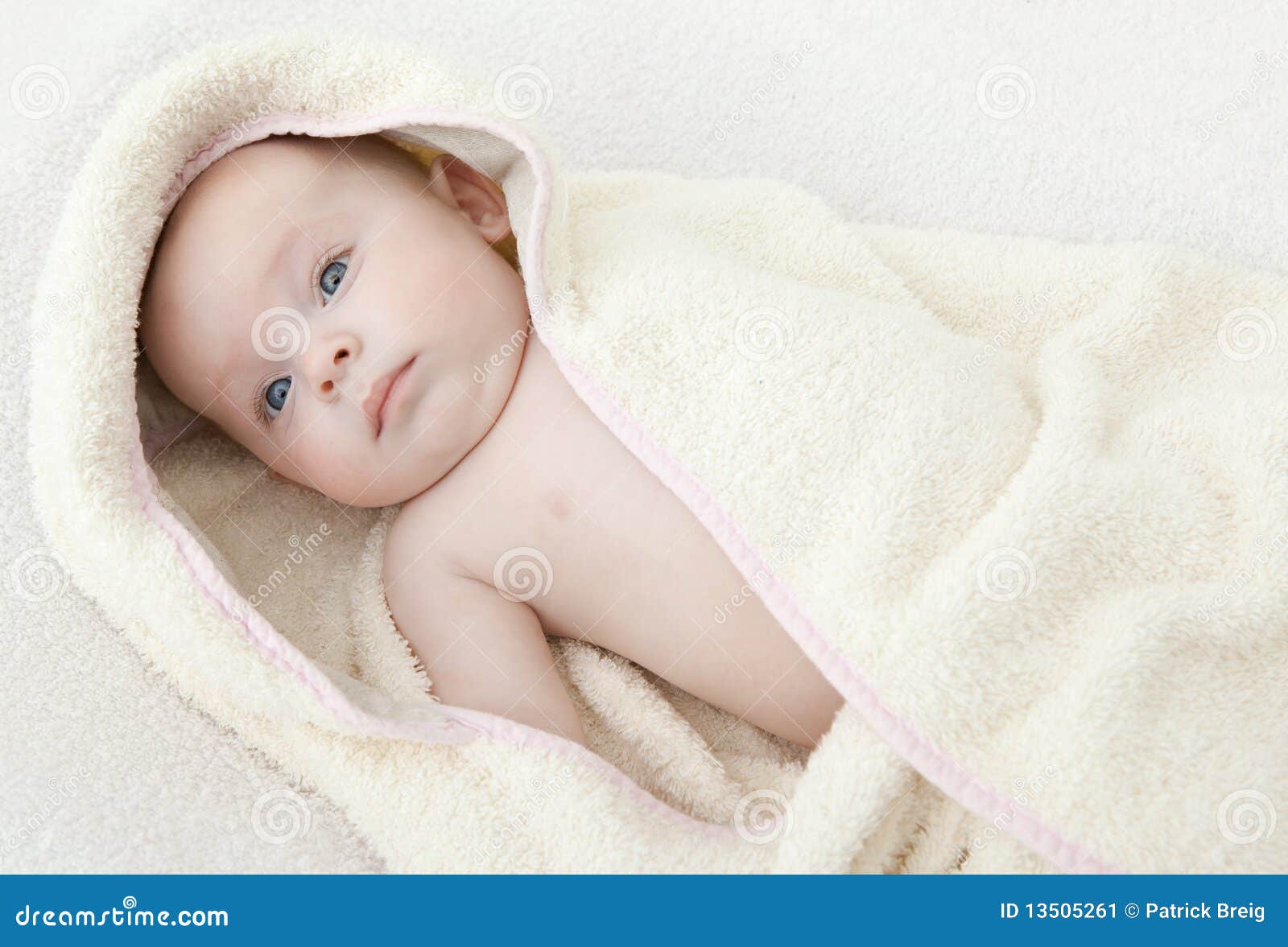 Baby in bathrobe.ter. stock image. Image of amazed, close 13505261