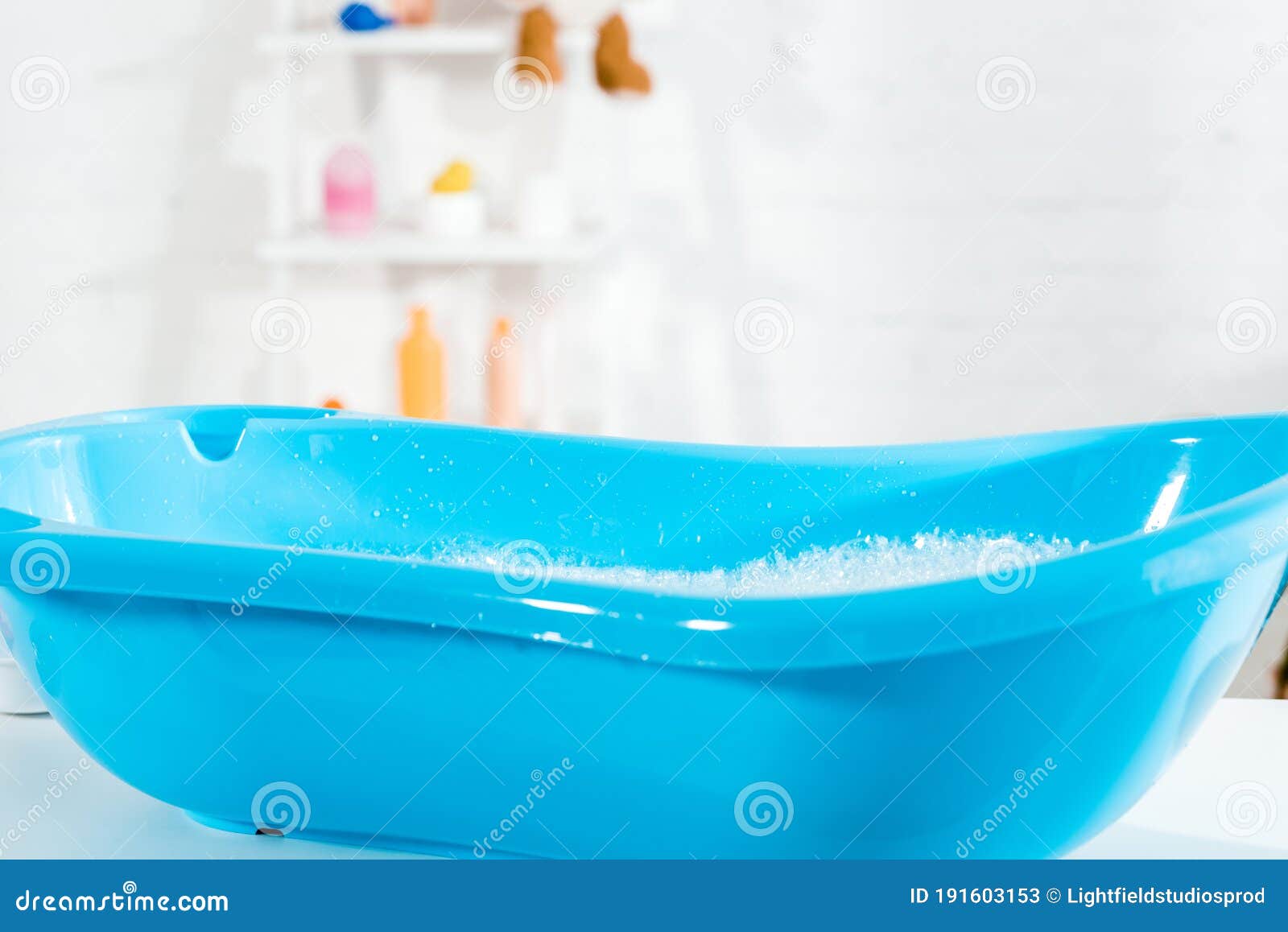 Baby Bathtub with Water and Bath Foam in Bathroom Stock Image Image of blue, bathroom 191603153