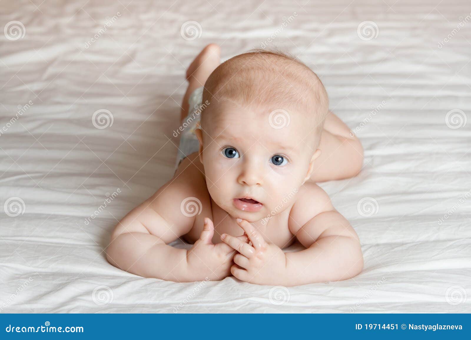 Baby on the bed stock image. Image of little, infants 19714451