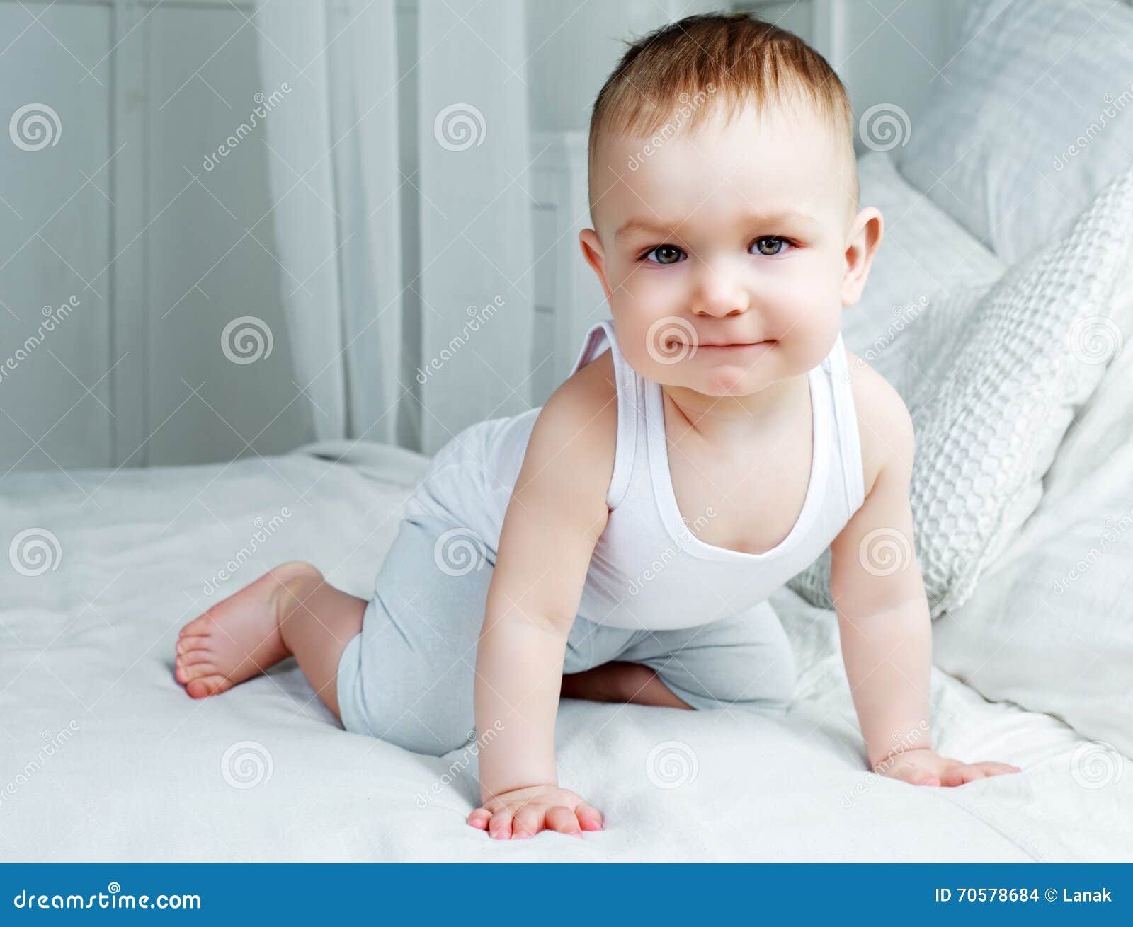Baby in bed stock photo. Image of beautiful, person, sitting 70578684