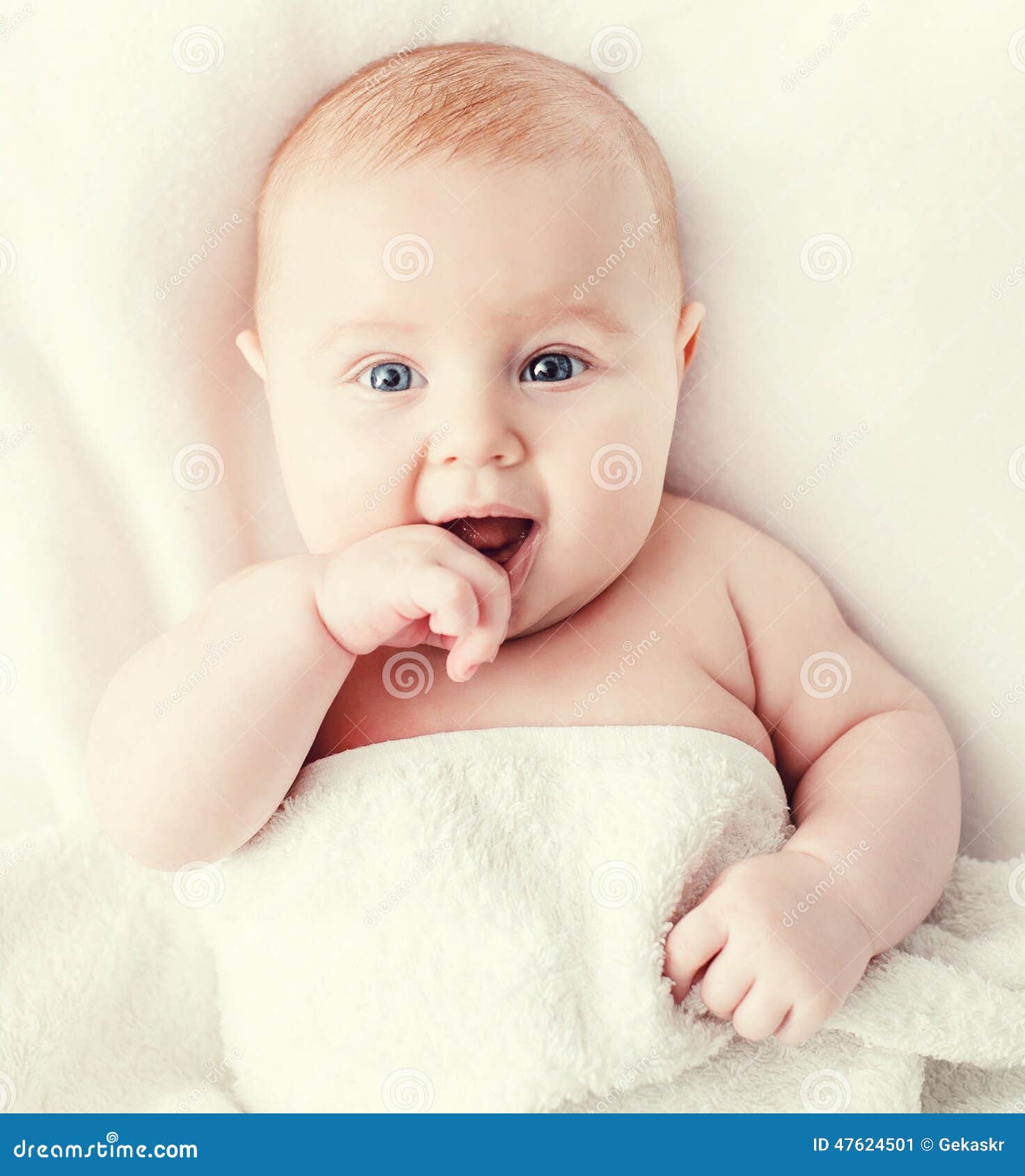 Baby on the bed stock image. Image of blue, caucasian 47624501