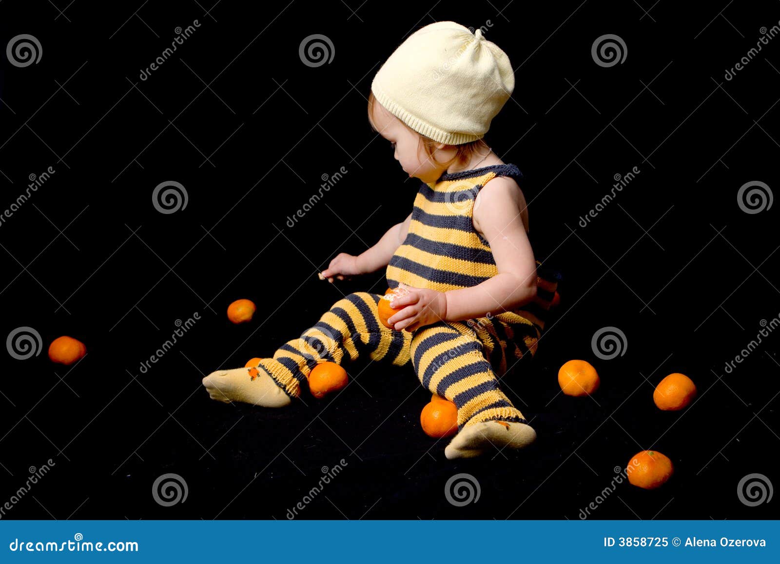 Babybee with tangerines stock image. Image of citrus 3858725