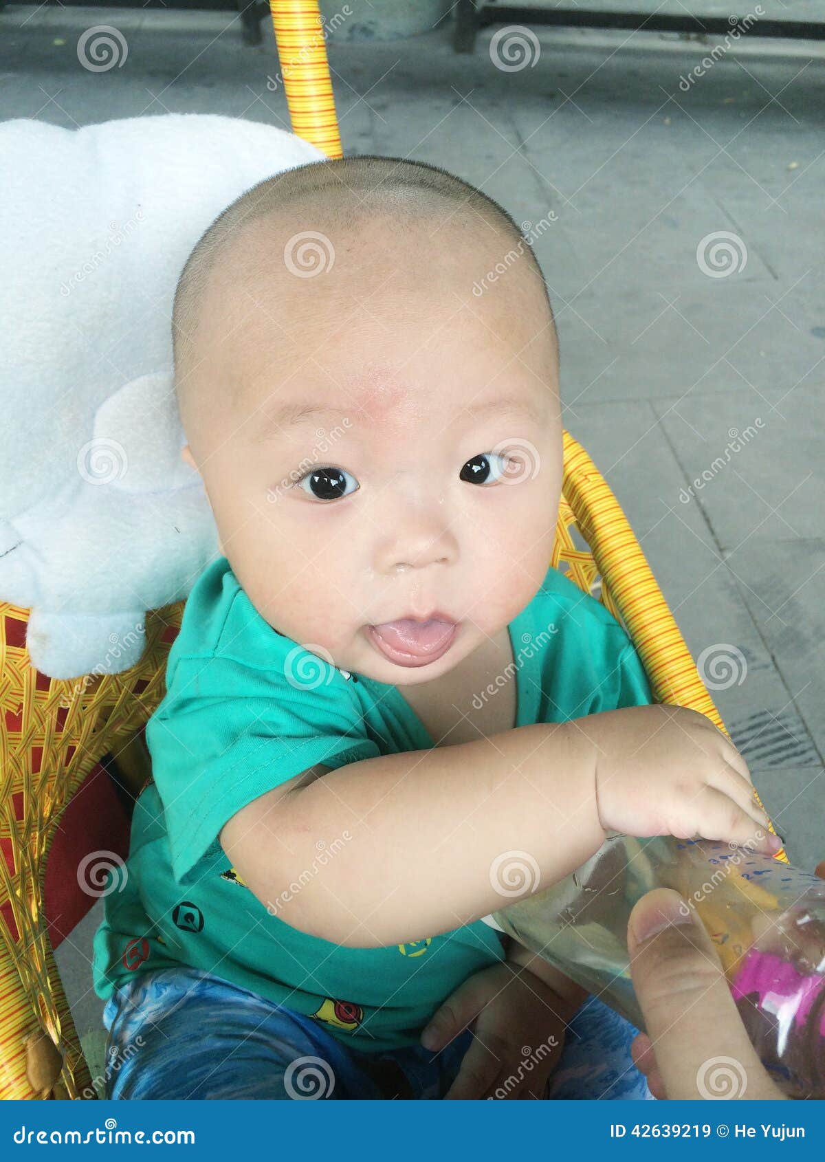 Baby being fed stock image. Image of eating, infant, touch - 42639219