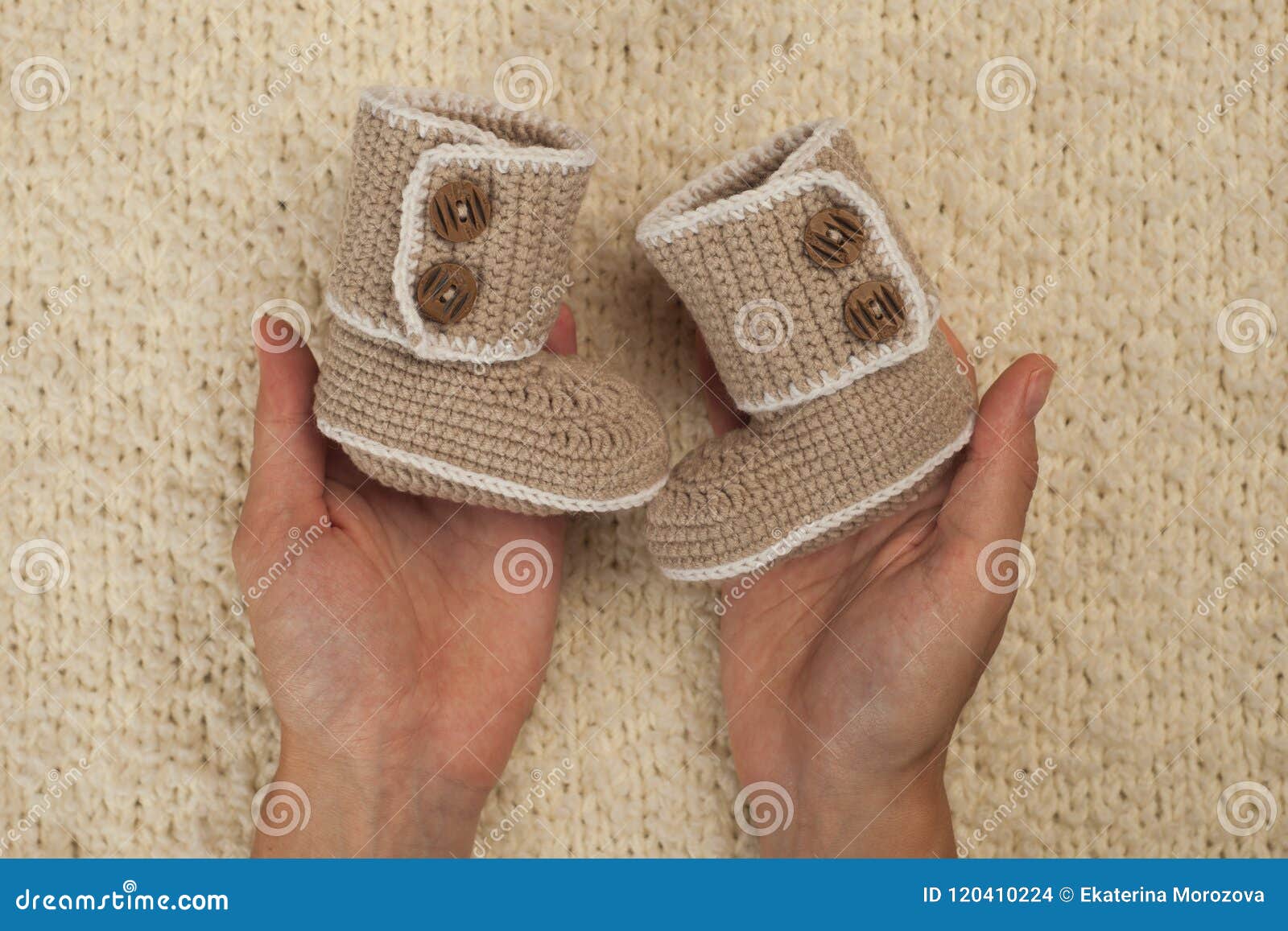 Baby Booties for Newborn Baby in Mother Hands, Pregnant Girl with Hand ...