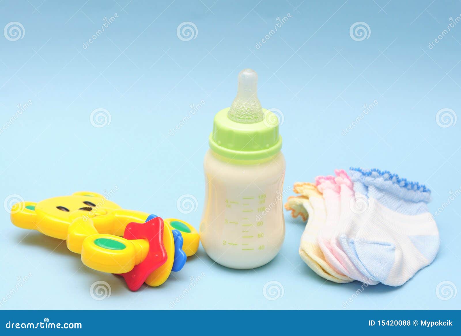 Baby Bottle, Rattle and Sock Stock Photo - Image of rattle, junior ...