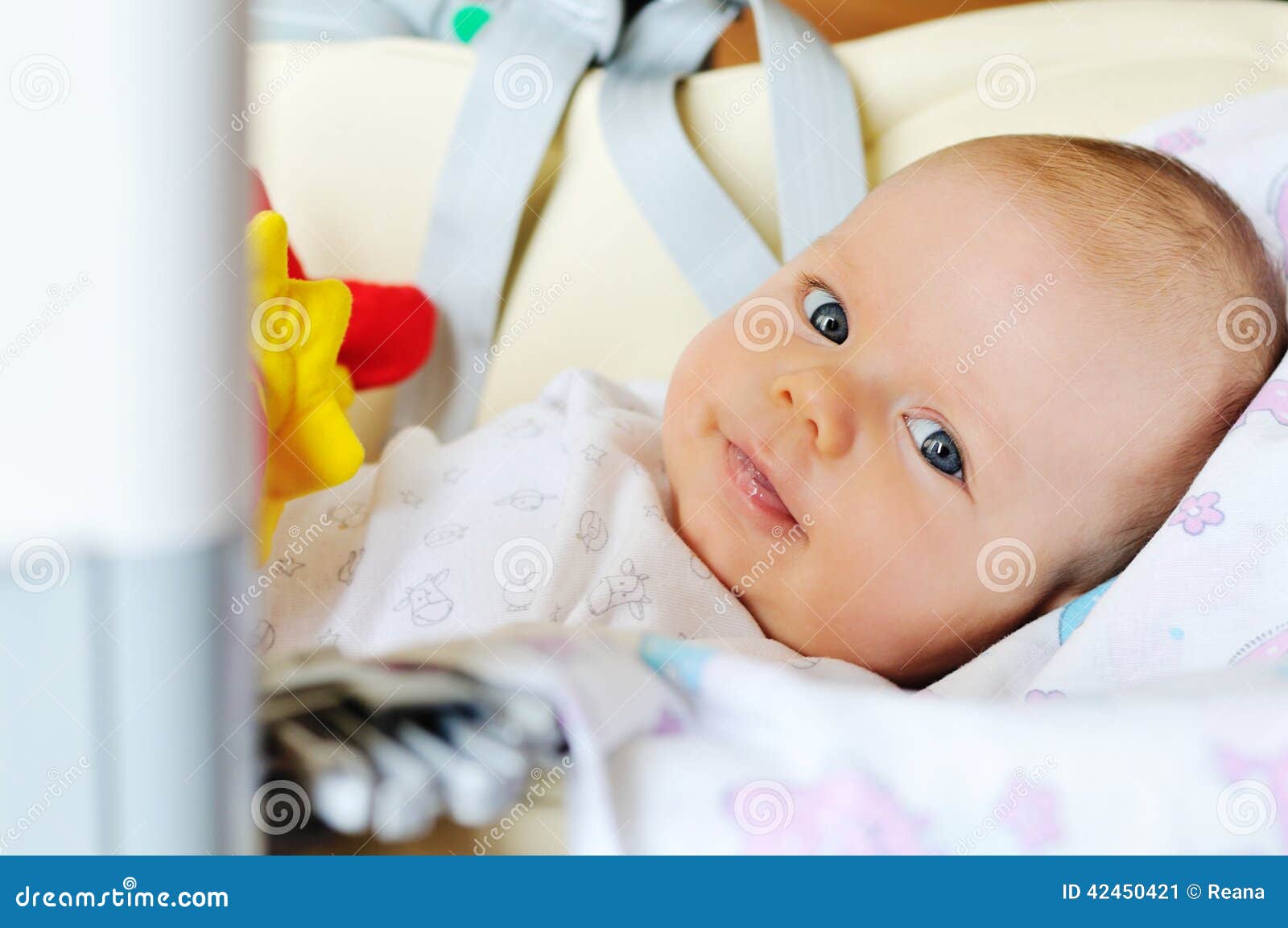Baby in bouncer chair stock image. Image of laying, born 42450421