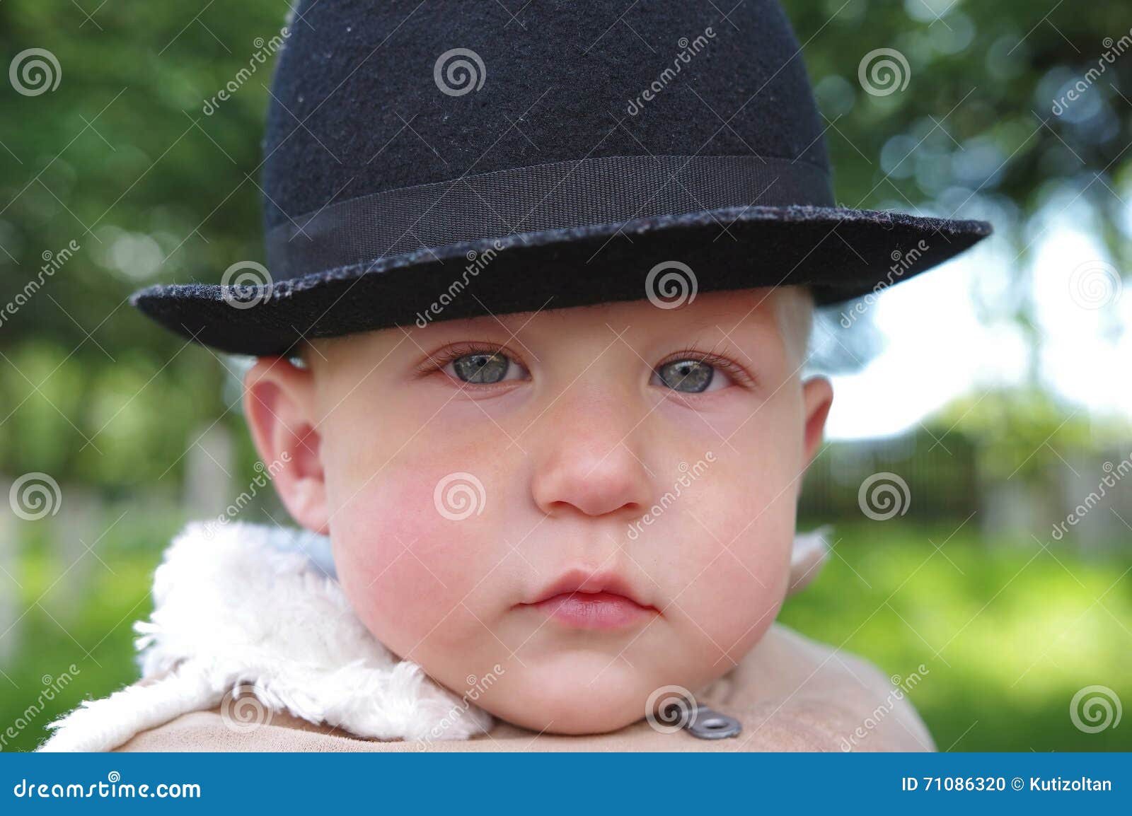 Baby boy with black hat stock photo. Image of children 71086320