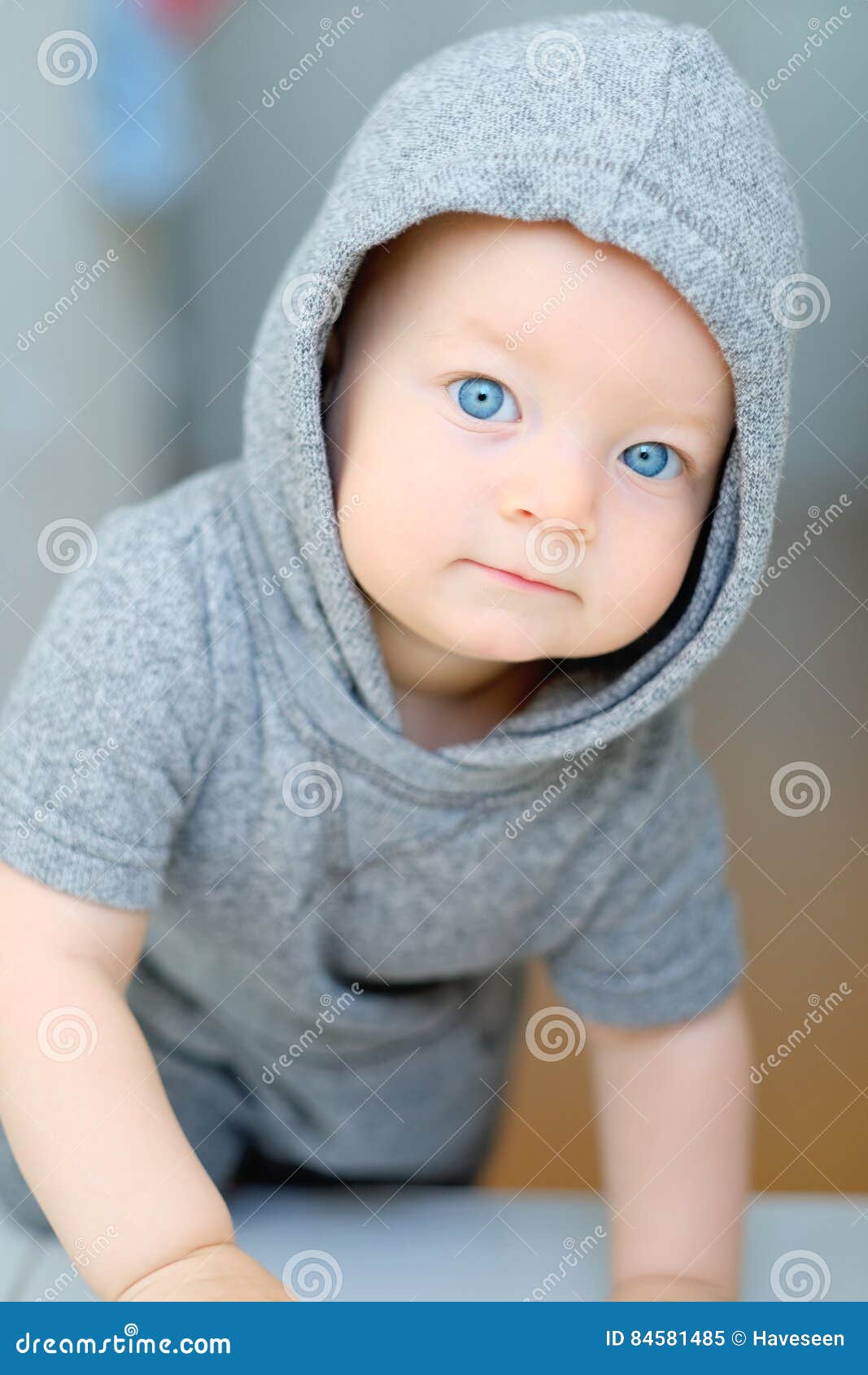 Baby boy with blue eyes portrait