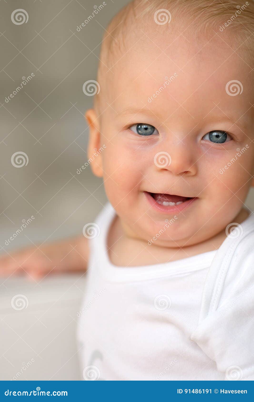 Baby boy with blue eyes stock image. Image of little 91486191