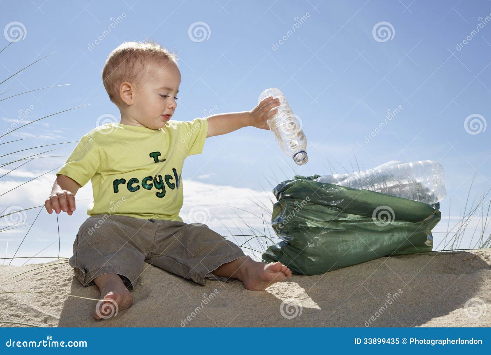 Baby Boy Collecting Bottle in Plastic Bag on Beach Stock Image Image