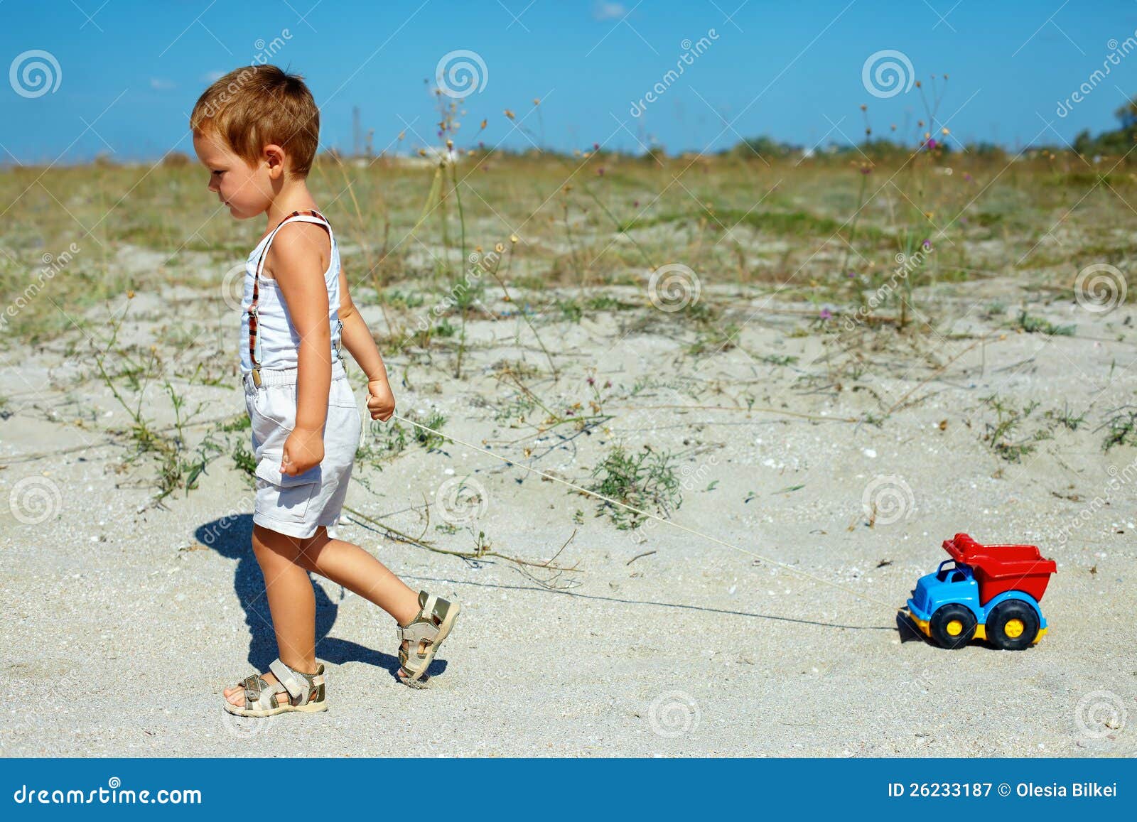 Baby Boy Dragging Toy Car Walking at Field Stock Image Image of