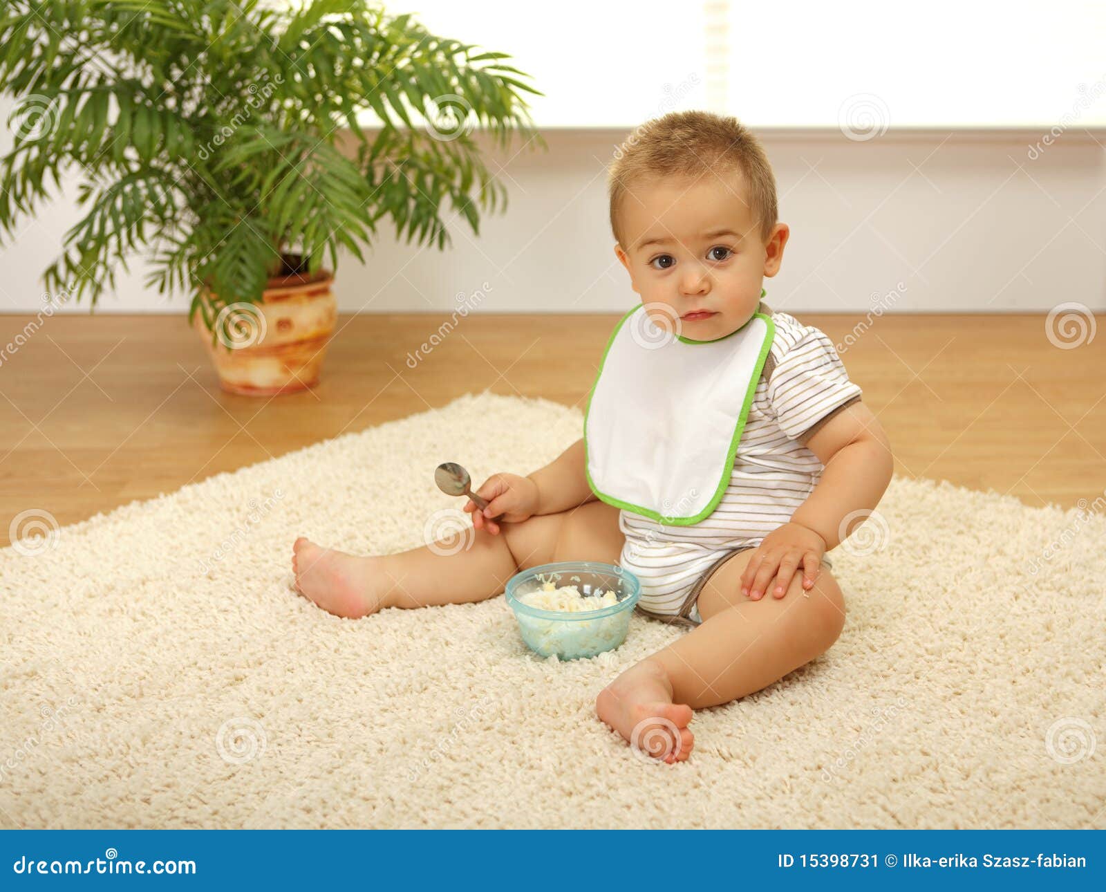 Baby boy eating stock image. Image of spoon, child, eating 15398731