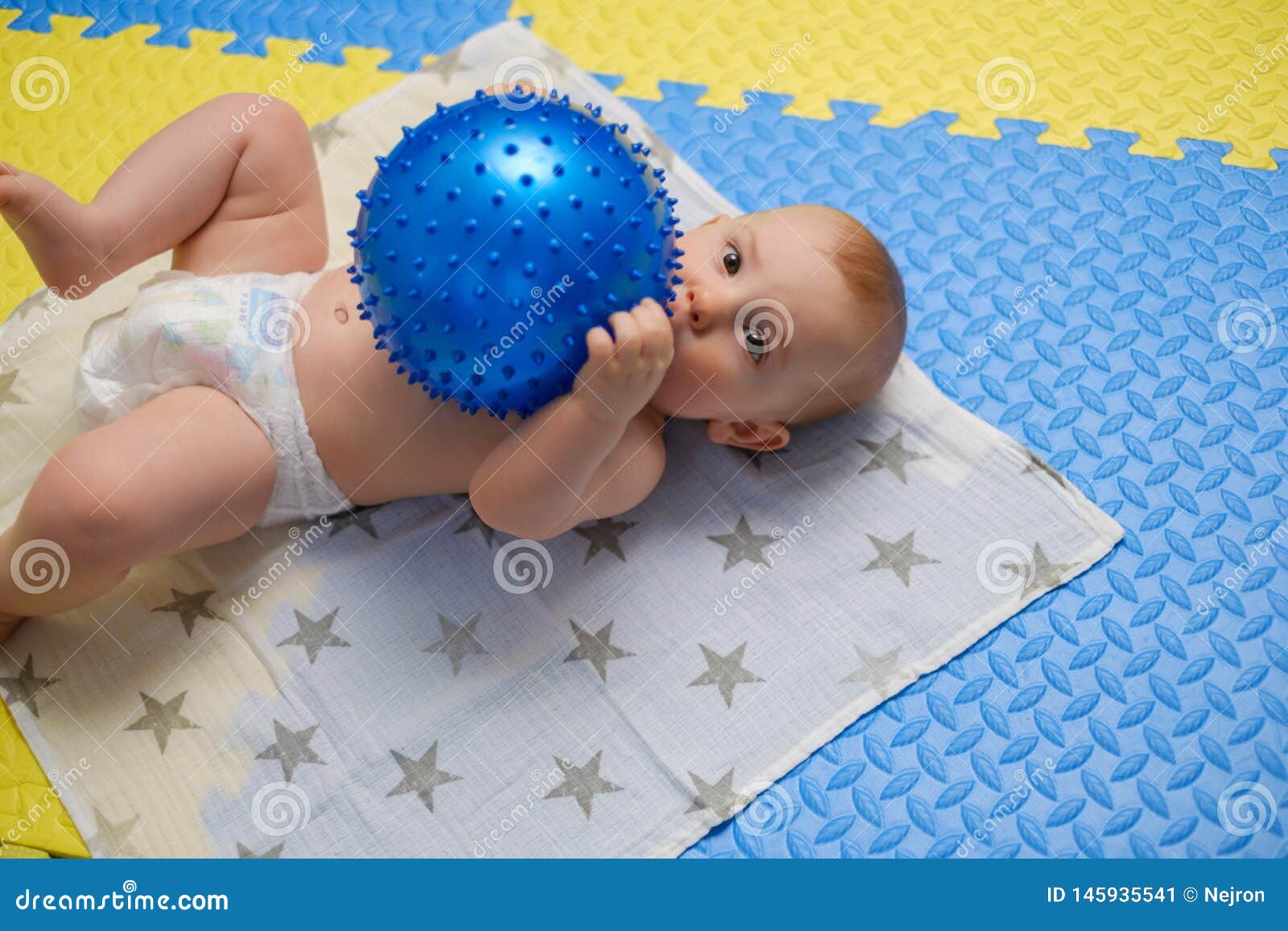 Baby Boy Getting Massage with Special Equipment Stock Image Image of