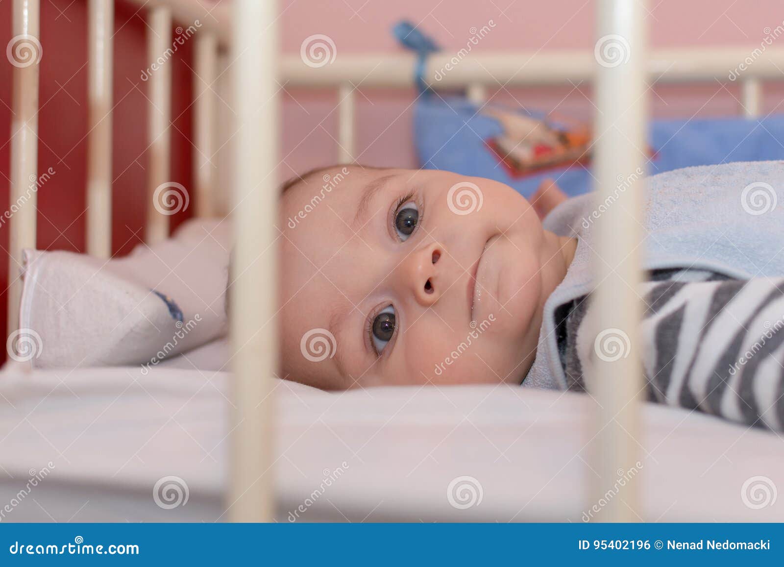 Baby Boy Lying on Back in a White Crib Stock Photo Image of home