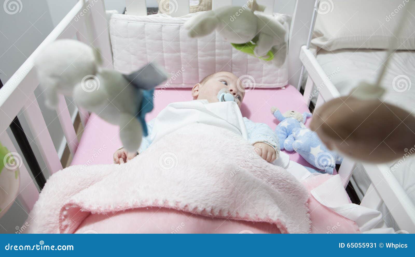 Baby Boy Lying in White Cot with Mobile Stock Image Image of crib
