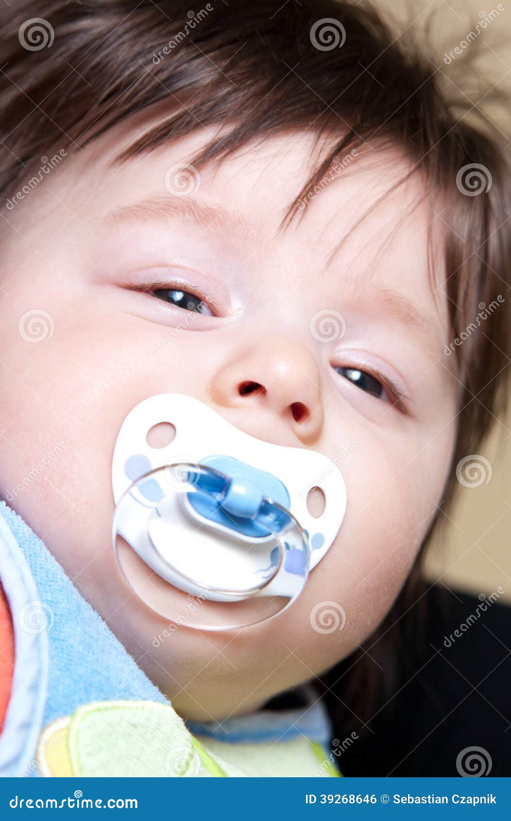 Baby boy with pacifier stock photo. Image of dummy, tired 39268646
