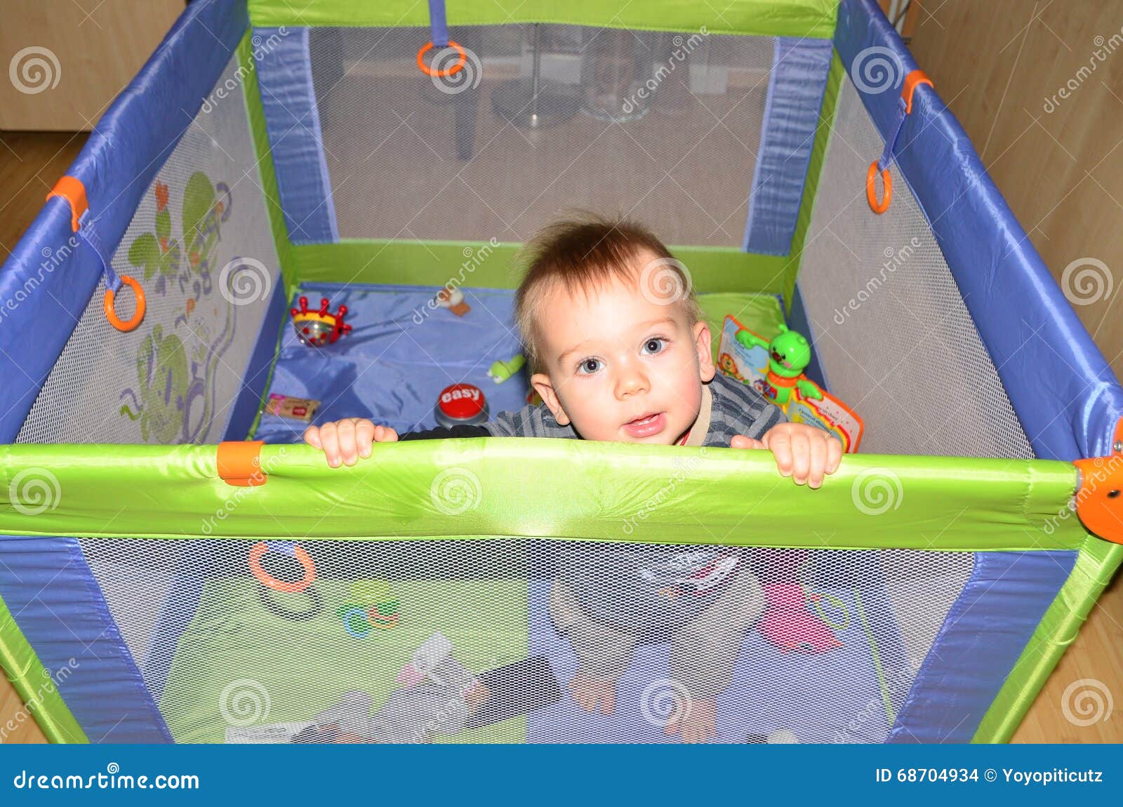 Baby boy in play pen stock photo. Image of face, childhood - 68704934