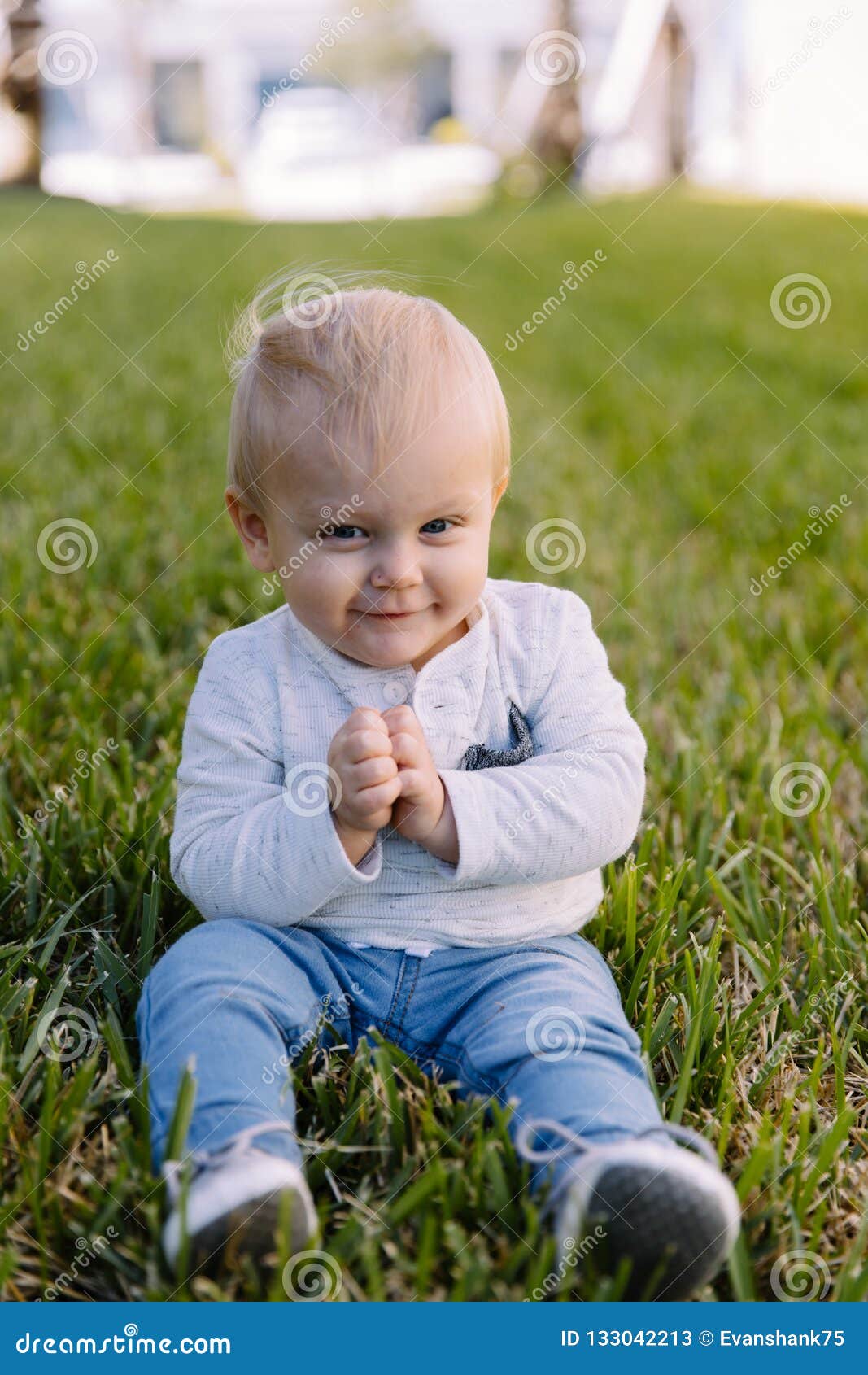 Cute and Adorable Young Toddler Baby Boy Playing in the Backyard Green ...