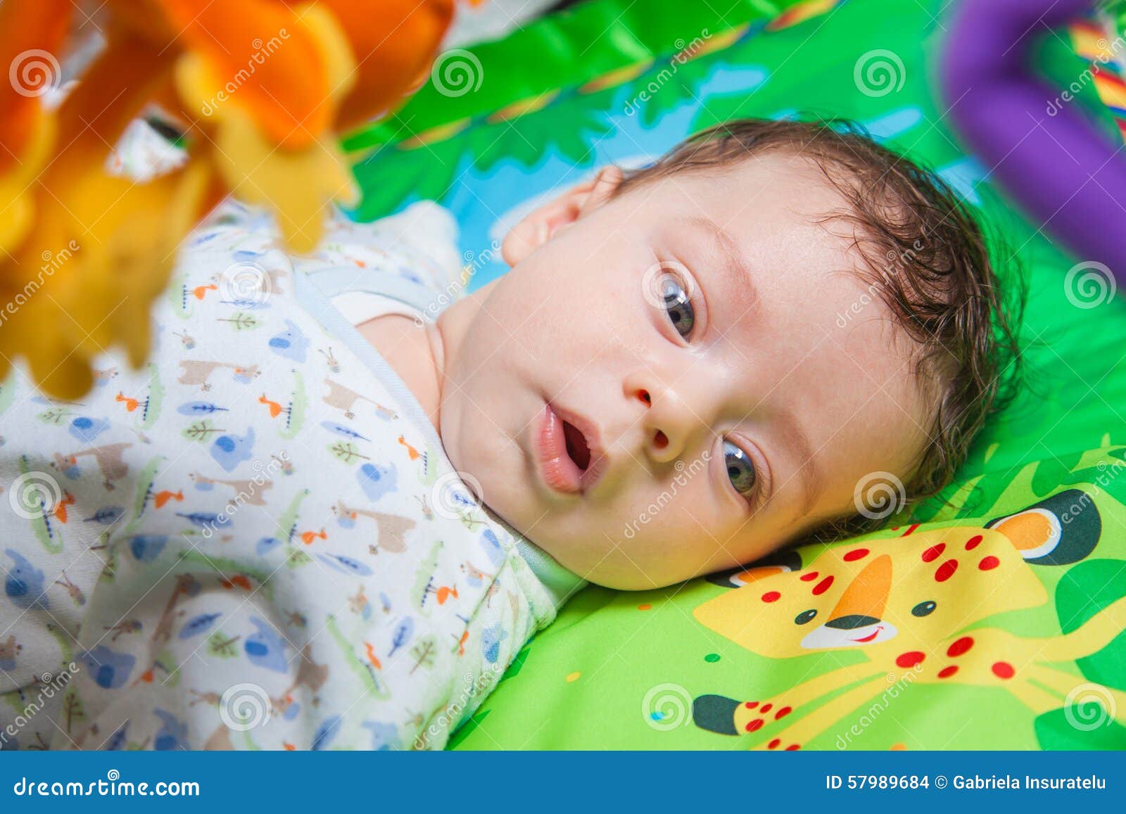Baby boy on playmat stock photo. Image of sweet, youth 57989684