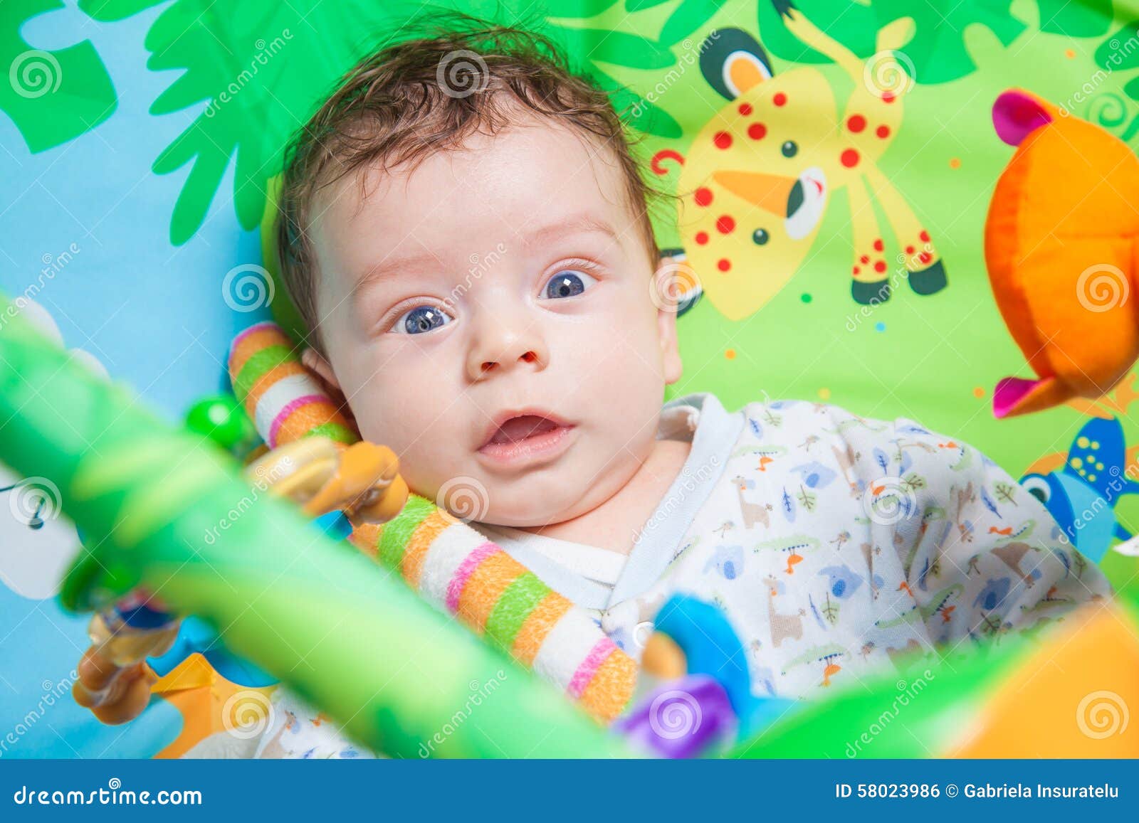 Baby boy on playmat stock photo. Image of innocent, nursery 58023986