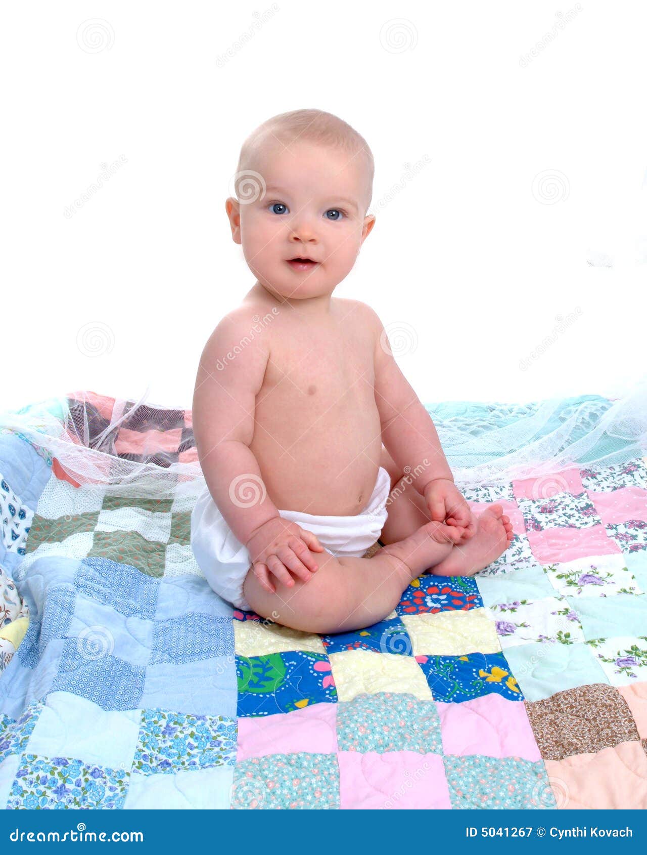 Baby boy on Quilt stock image. Image of quilt, child, prints 5041267