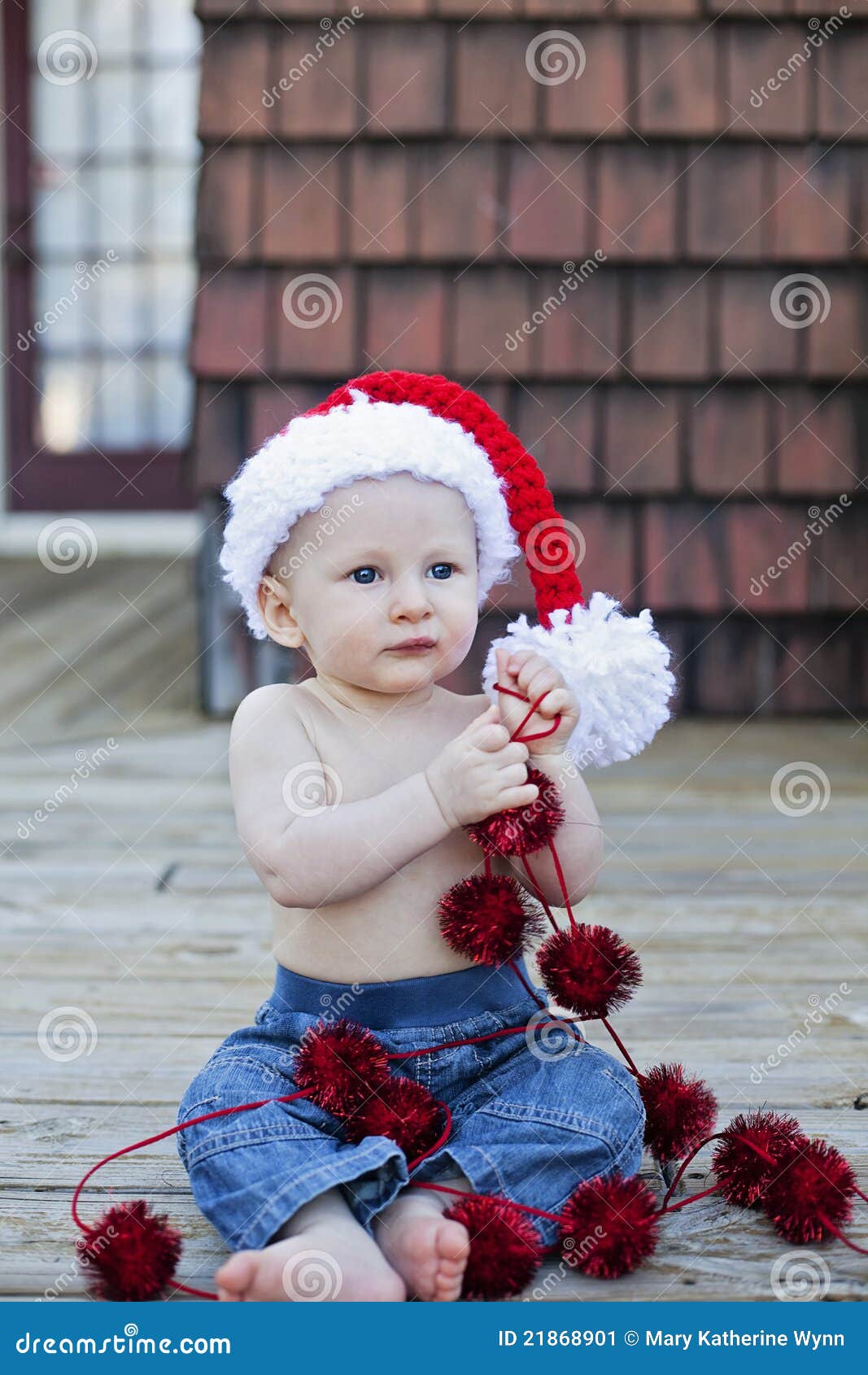 Baby boy in santa hat stock image. Image of holiday, playing 21868901