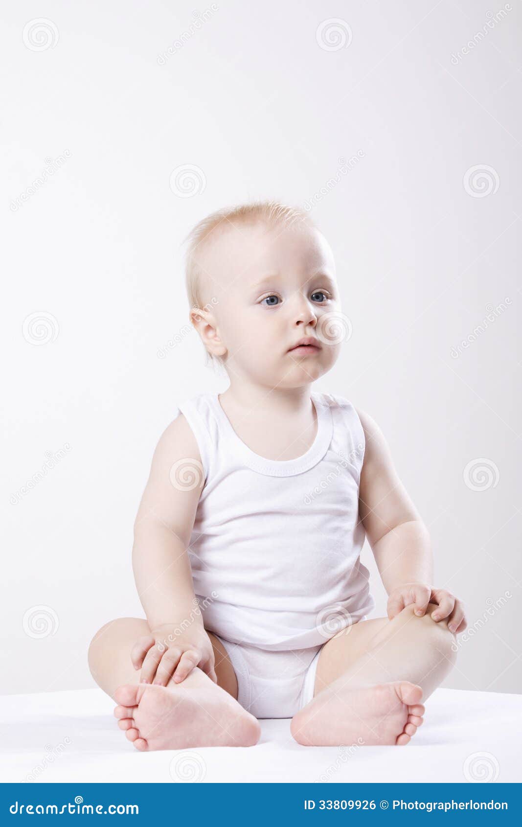 Baby Boy Sitting On Floor Royalty Free Stock Image - Image: 33809926