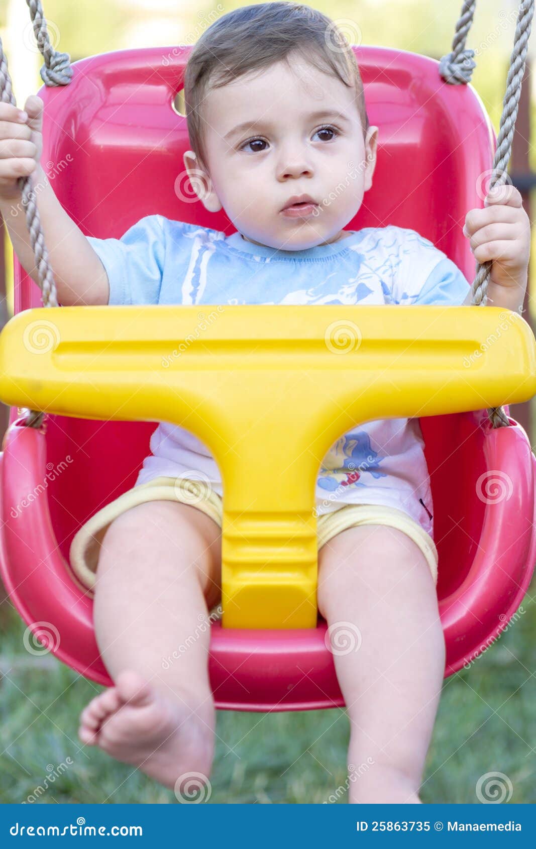 Baby boy in swing stock image. Image of outside, people 25863735