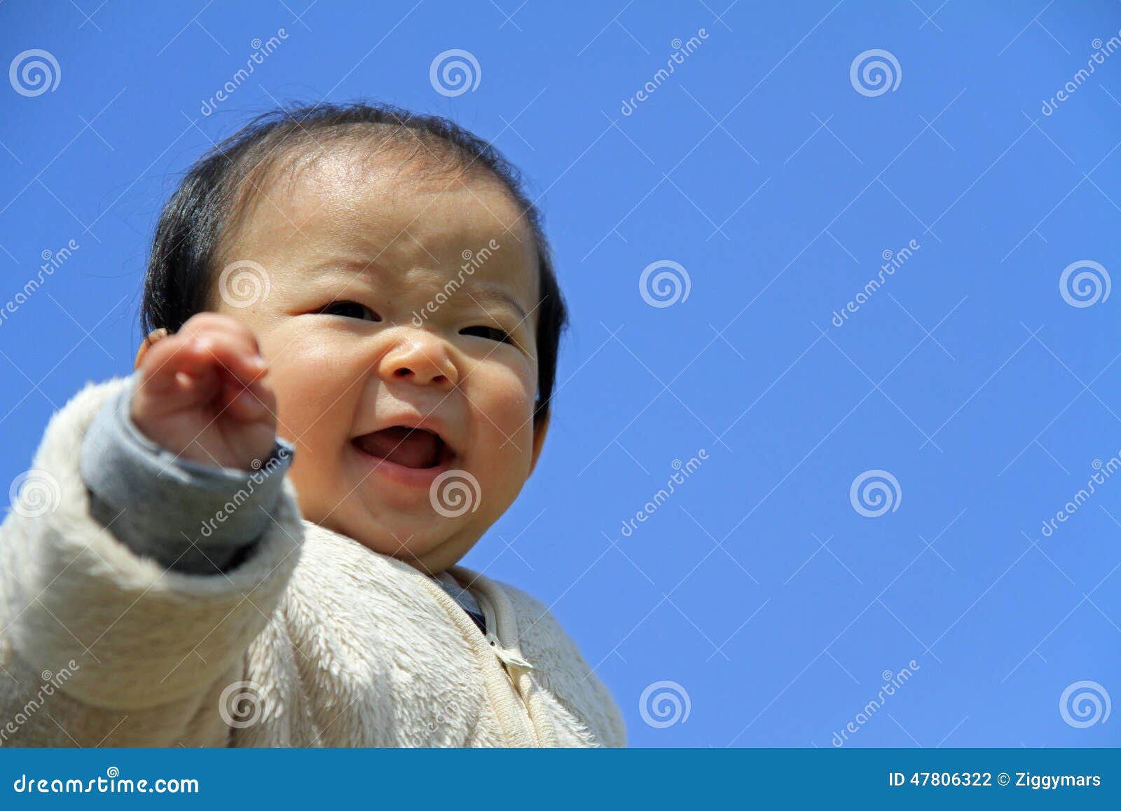 Baby boy under blue sky stock photo. Image of small, years 47806322