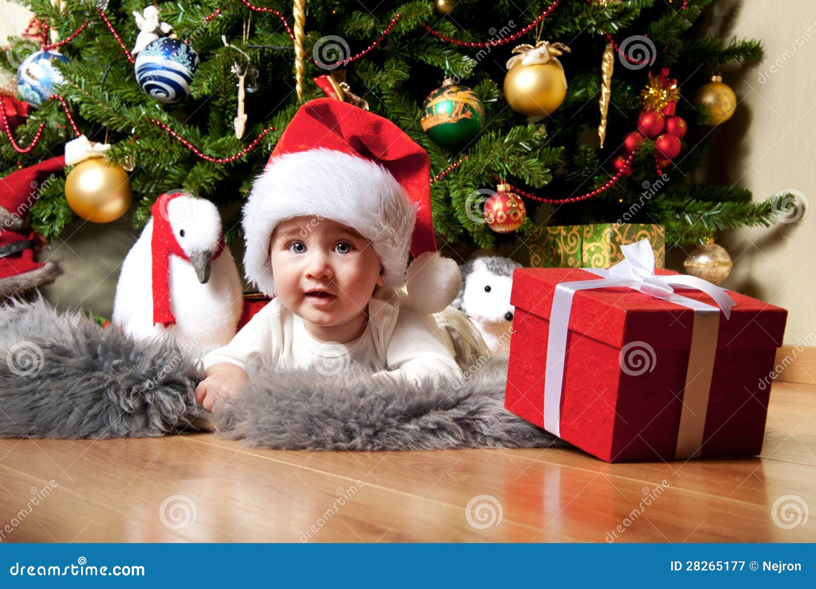 Baby Boy Under Christmas Tree Stock Image Image of bright, beautiful