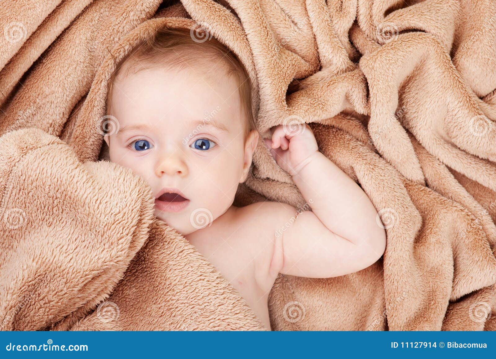Baby with brown towel stock photo. Image of positive 11127914