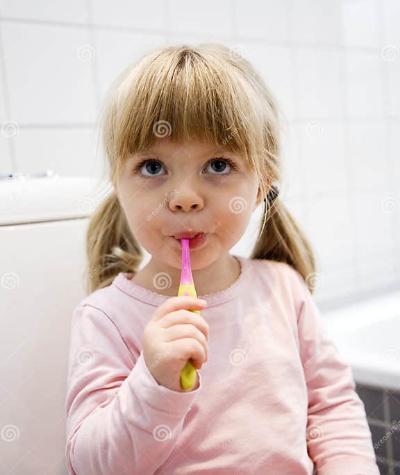 Baby Brushing teeth stock photo. Image of enjoyment, toothbrush 27178712