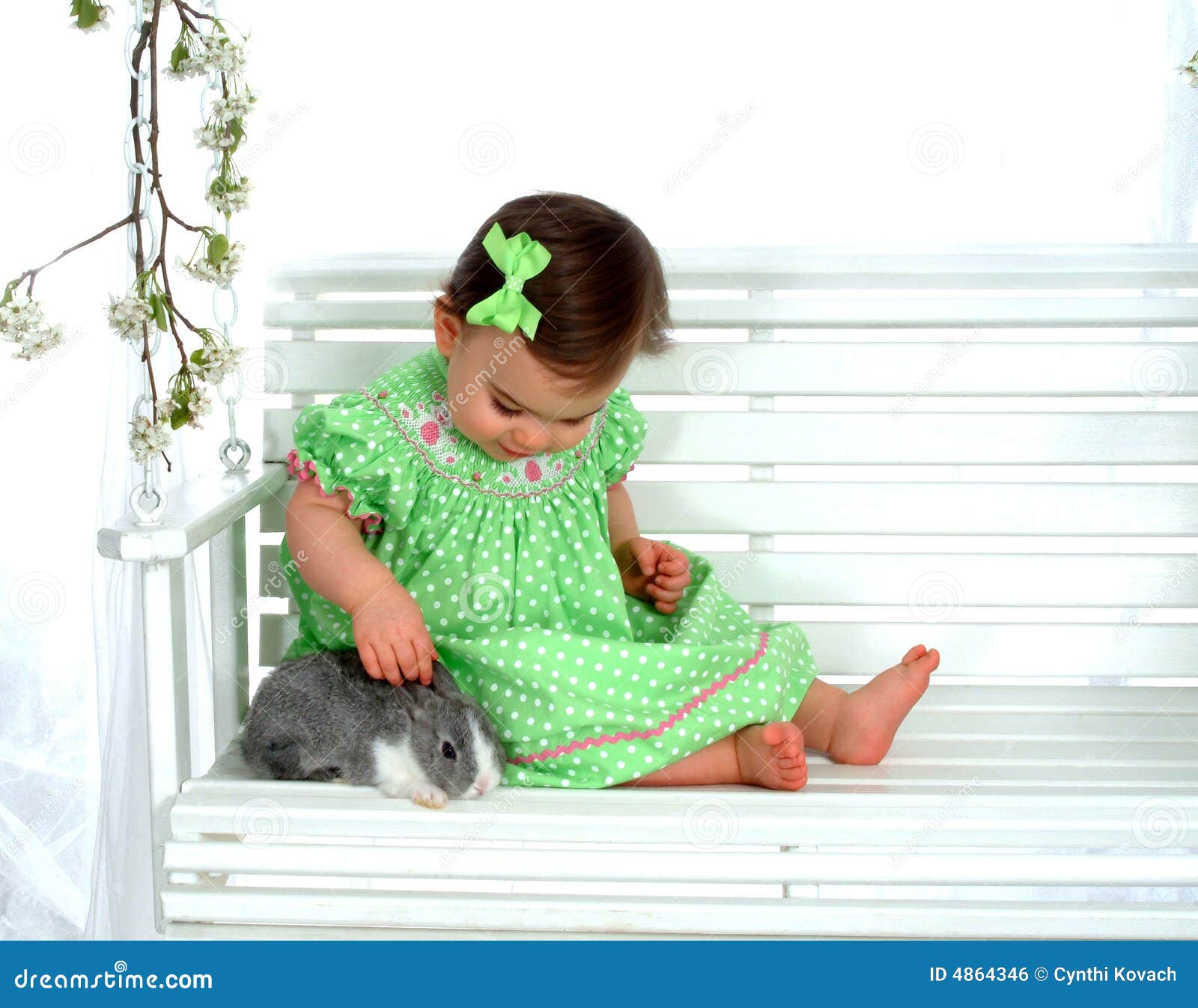 Baby and bunny on Swing stock photo. Image of bunny, delight 4864346
