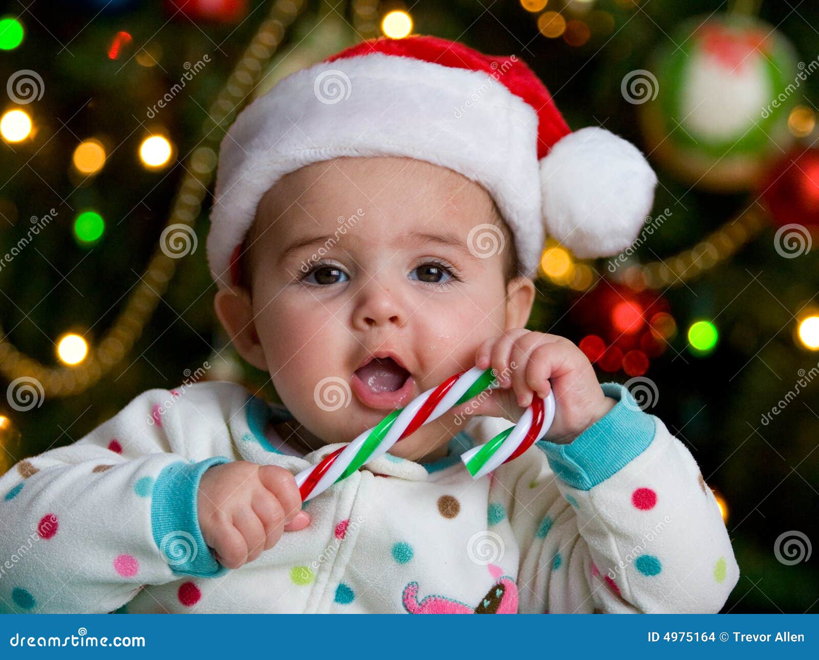 Baby with a Candy cane stock photo. Image of decorations 4975164