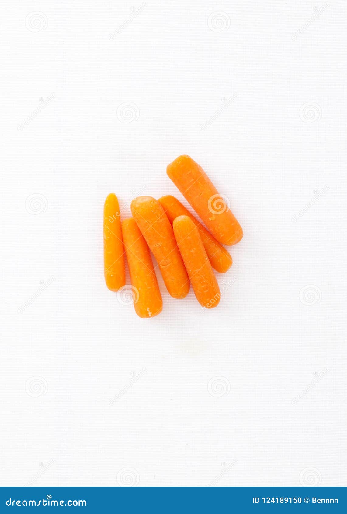 Baby carrots on white stock photo. Image of healthy 124189150
