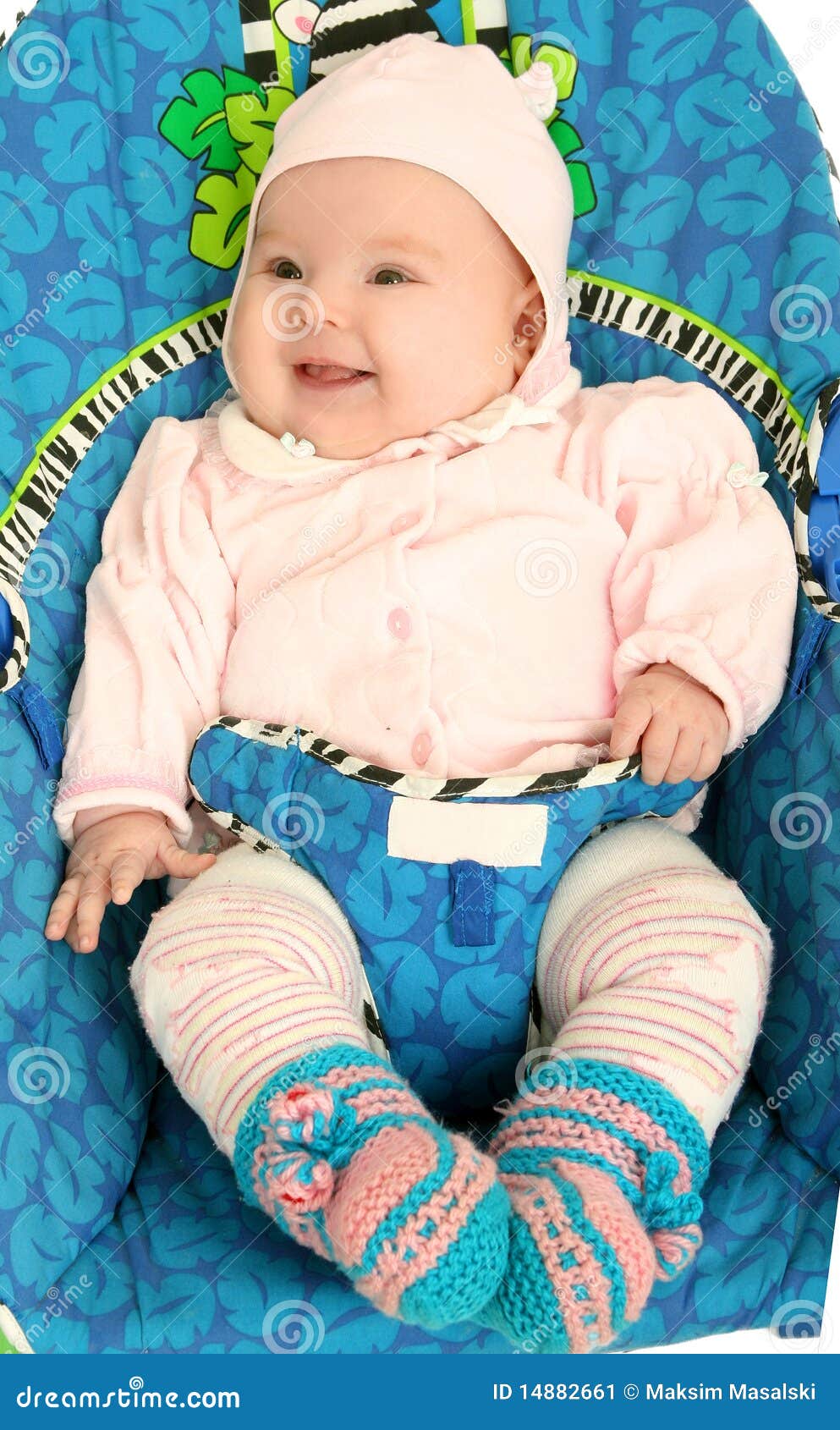 Baby in childs armchair stock image. Image of transportation 14882661