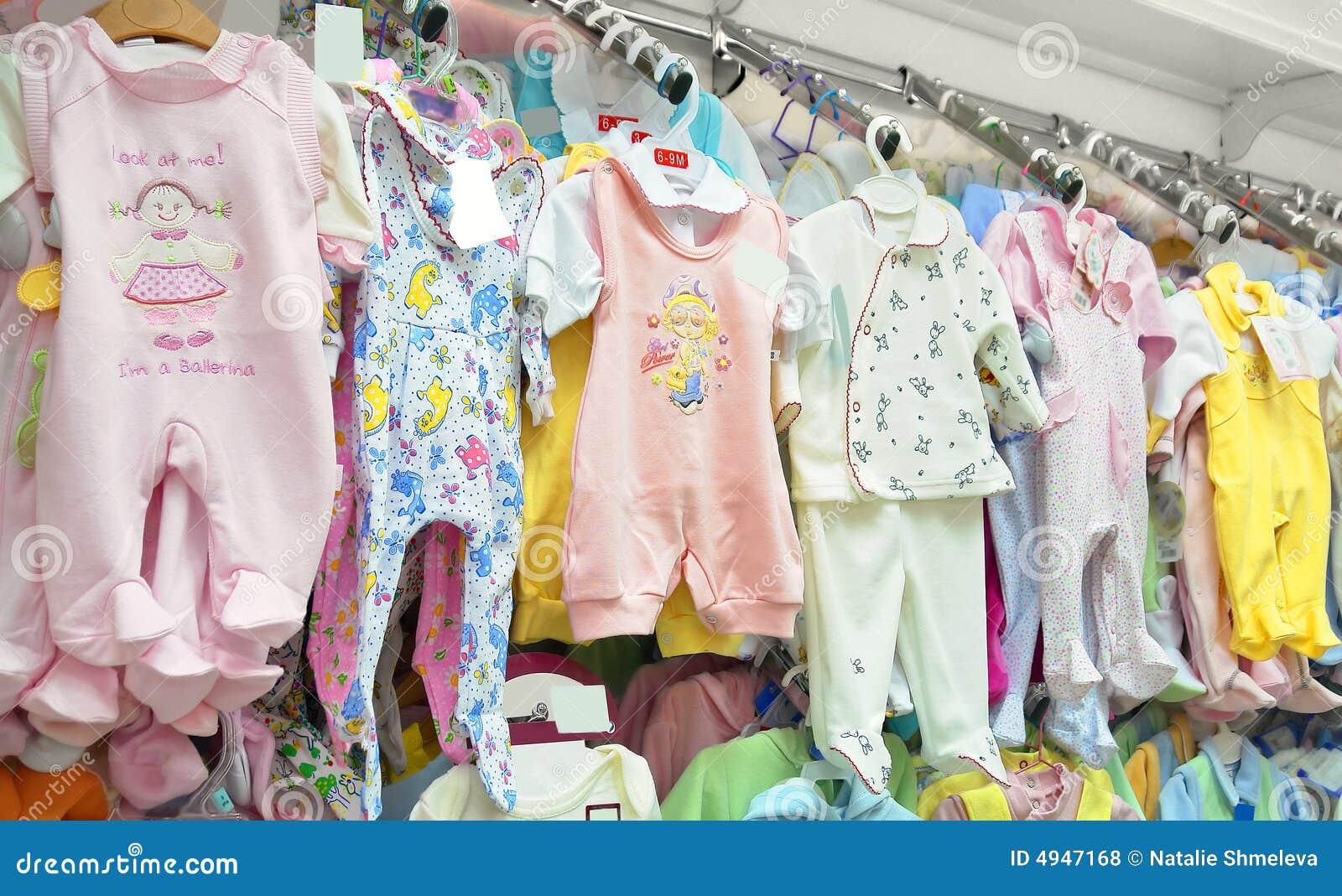 Hangers with Baby Clothes on Rack Stock Photo - Image of garments, inside:  132793586