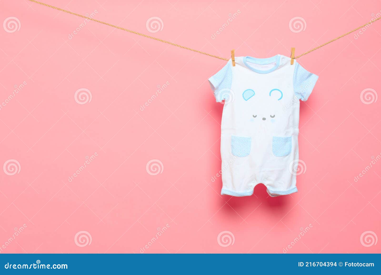 Clothes Fly Off The Clothesline On A Hanger. RoyaltyFree Stock Image