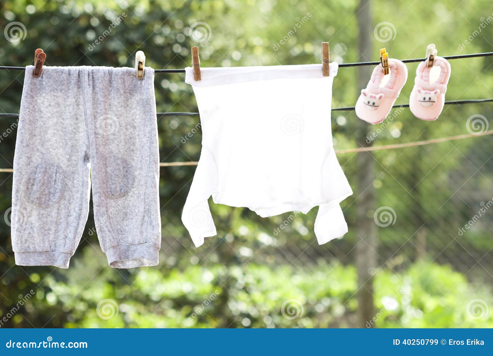 Baby Clothes Hanging on the Clothesline Stock Image Image of