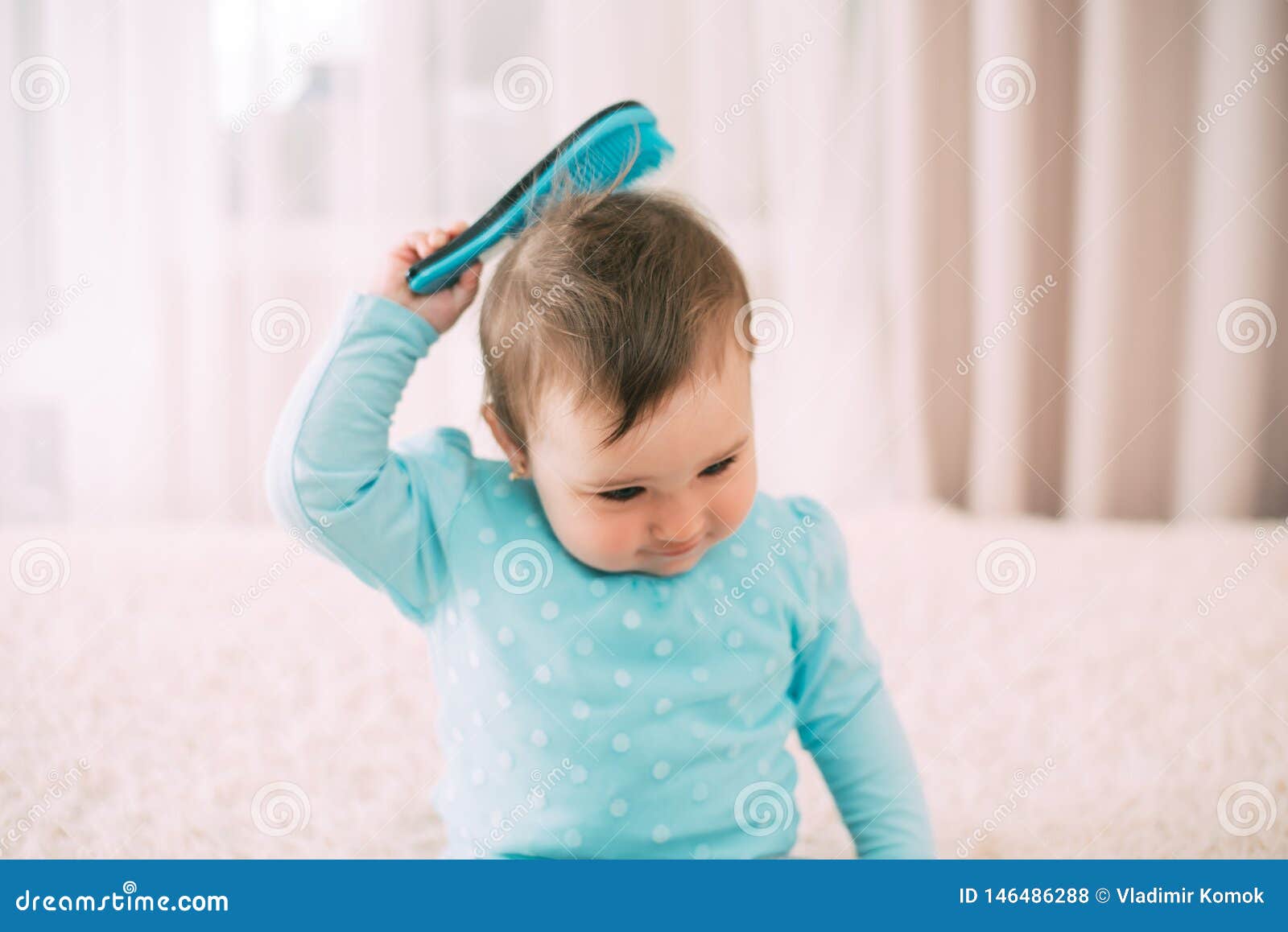Baby with a Comb a Little Girl with a Blue Comb Comb Combs Her Hair Stock  Photo - Image of child, beautiful: 146486288