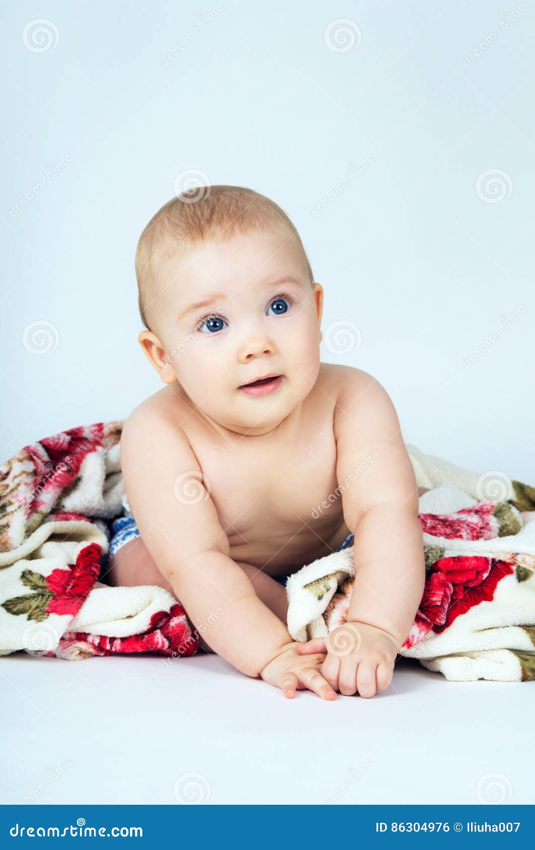 Baby Covered with a Bright Blanket Stock Photo Image of creeping