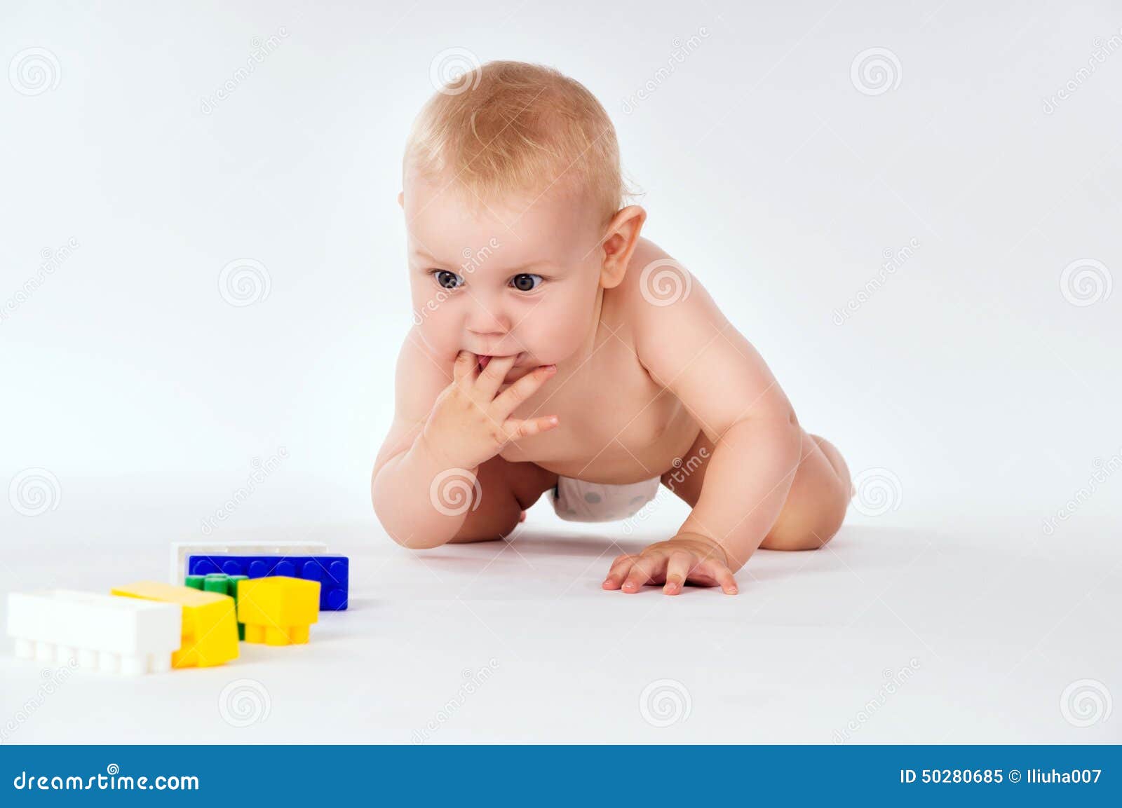 Baby crawls on all fours stock image. Image of laughing 50280685