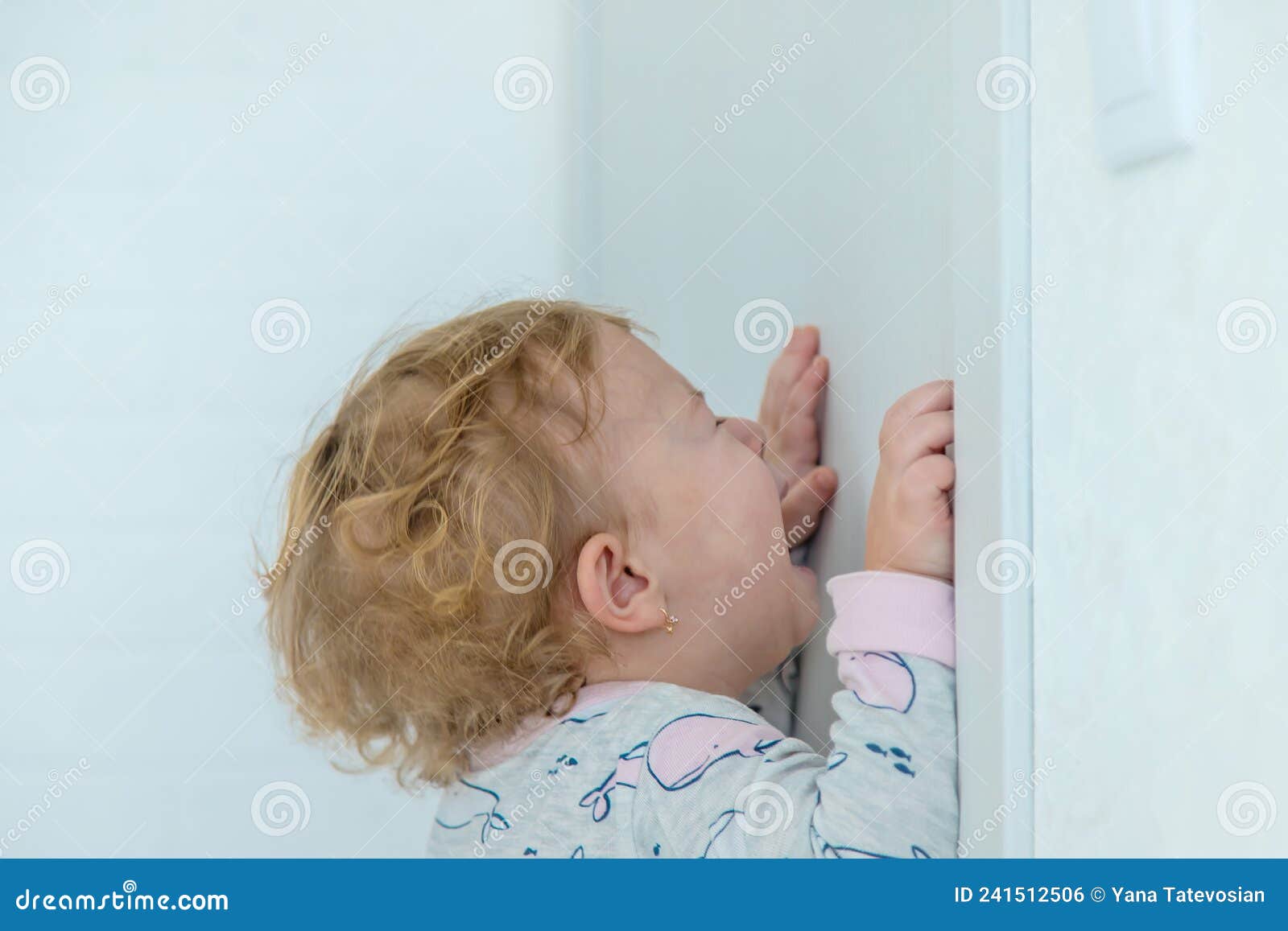 A Baby Cries In The Crib, A Boy Of 6 Months Screams Or Cries At Home