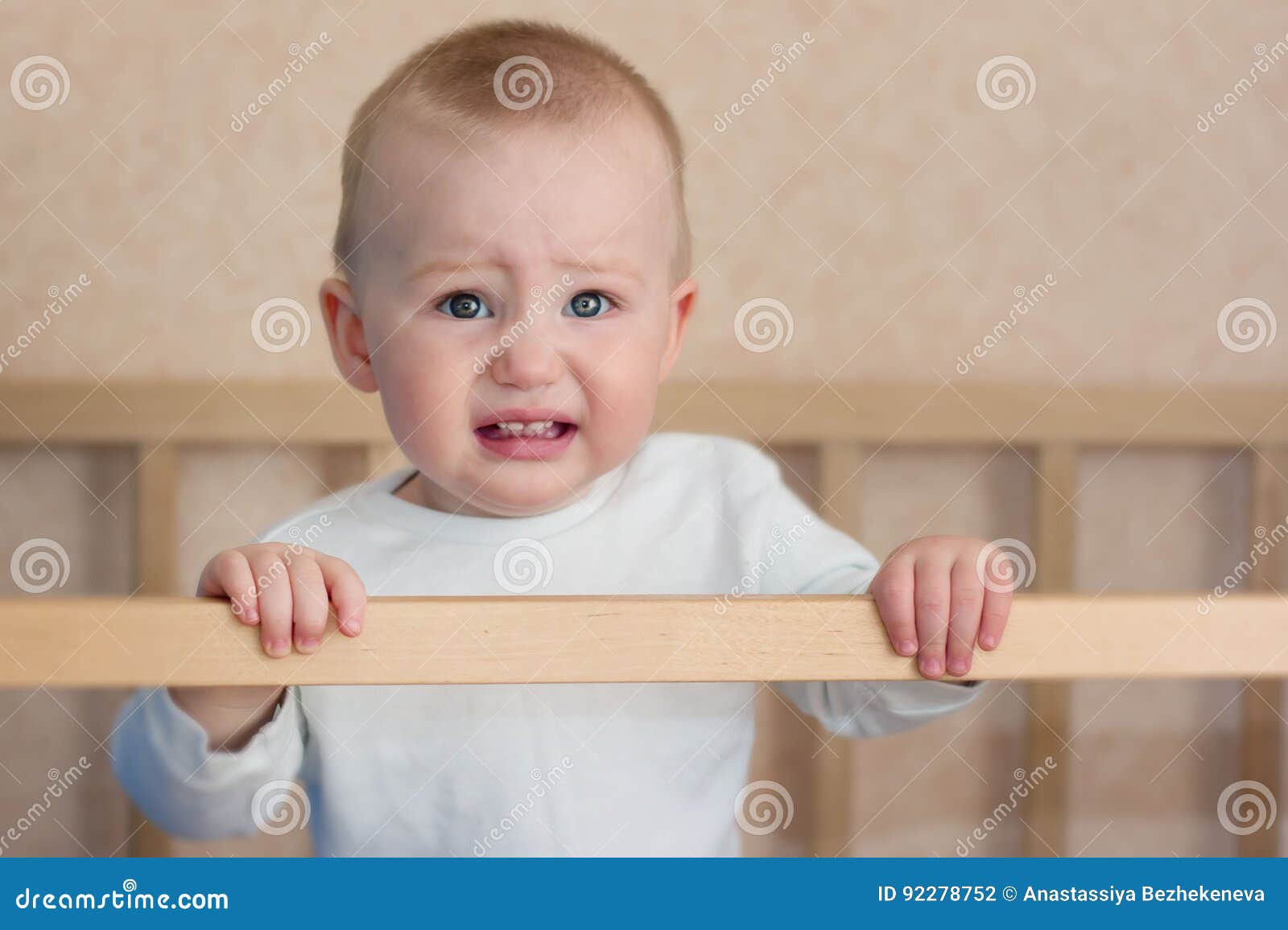 Baby cry in cot stock photo. Image of healthy, cradle 92278752
