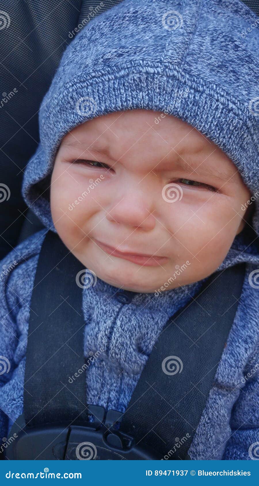 Baby crying in car seat stock image. Image of stroller 89471937