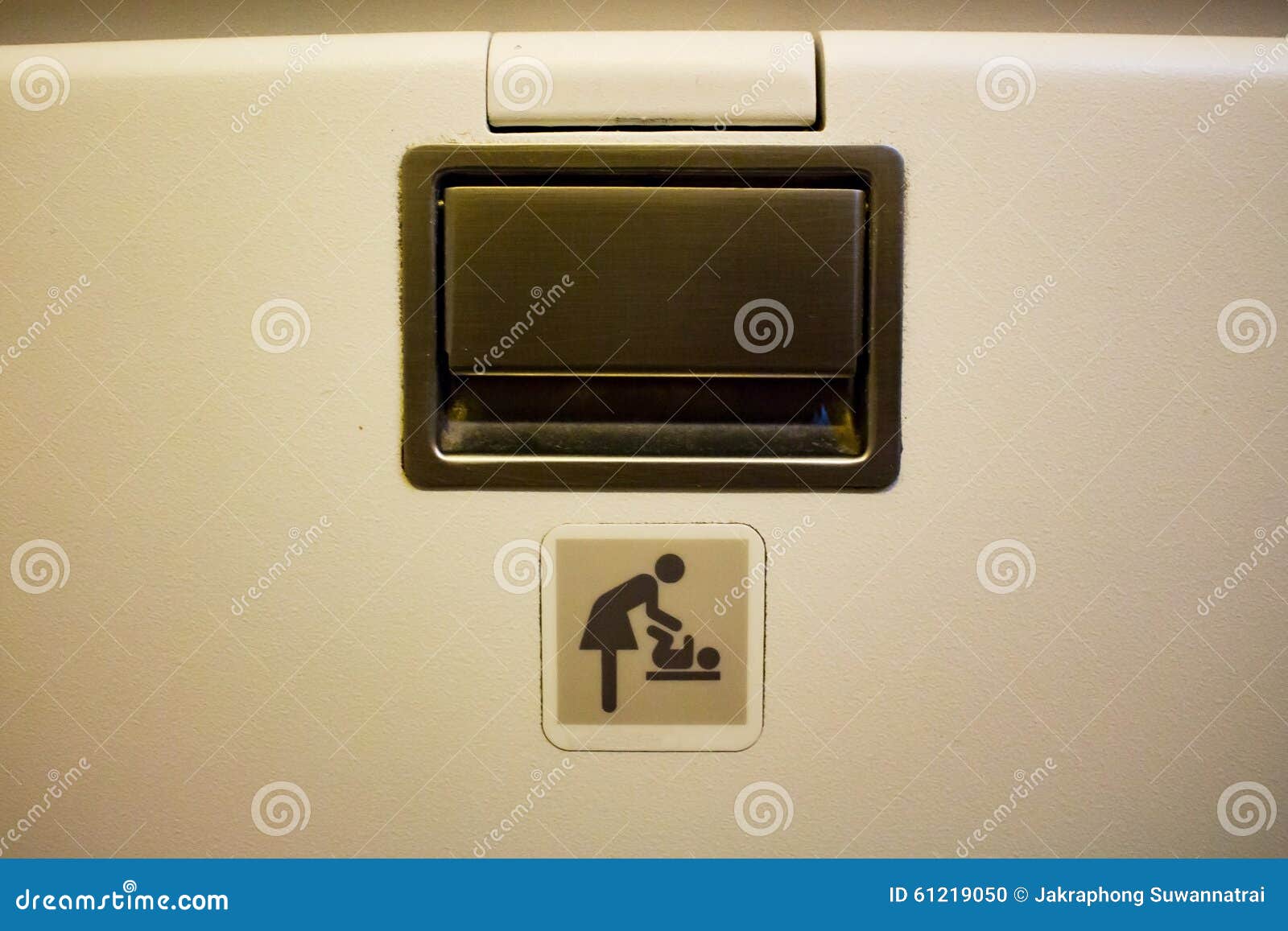 Baby Diaper Change Sign on a Airplane Stock Photo Image of lady