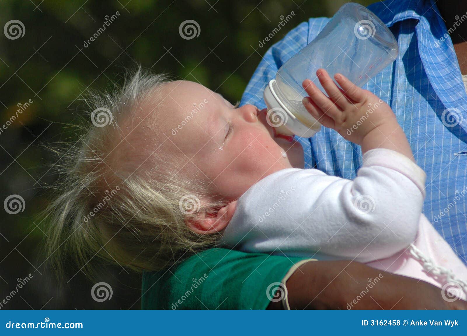 Baby drinking bottle stock photo. Image of black, little 3162458
